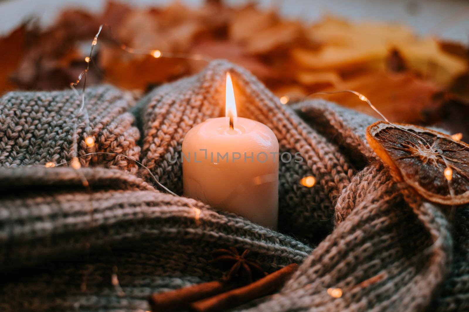 Autumn leaves and candles . cozy vibes. Autumn article. Printed products autumn.