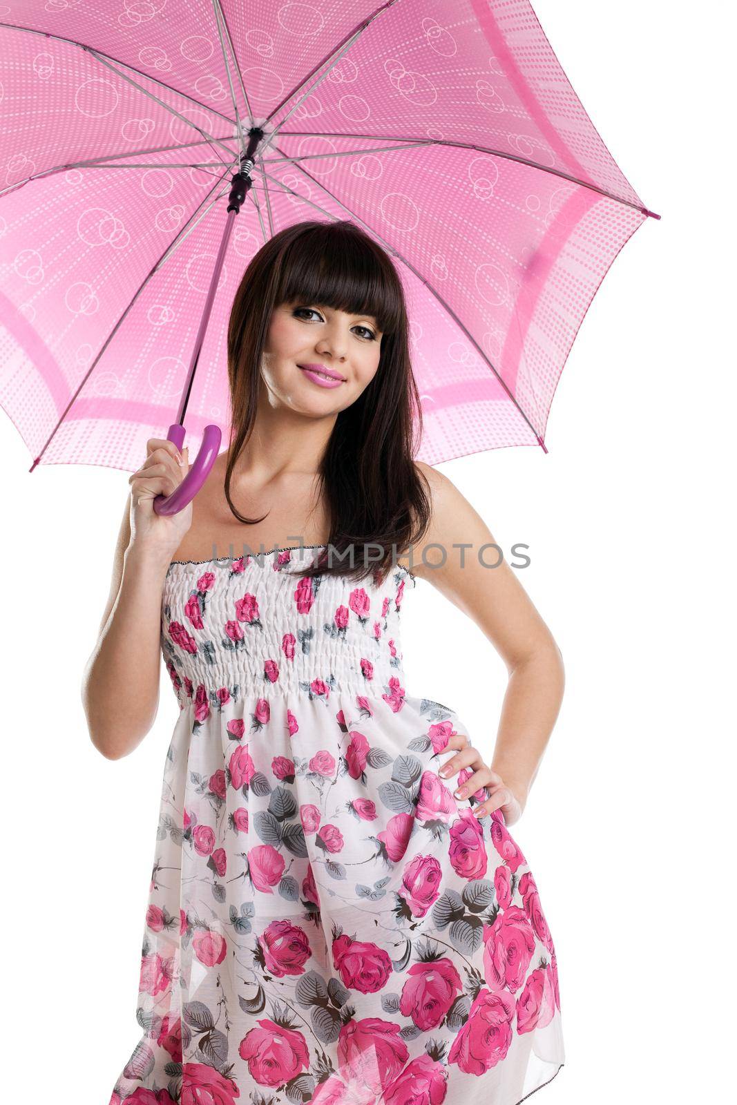 Young woman with rose umbrella look at you and smile isolated