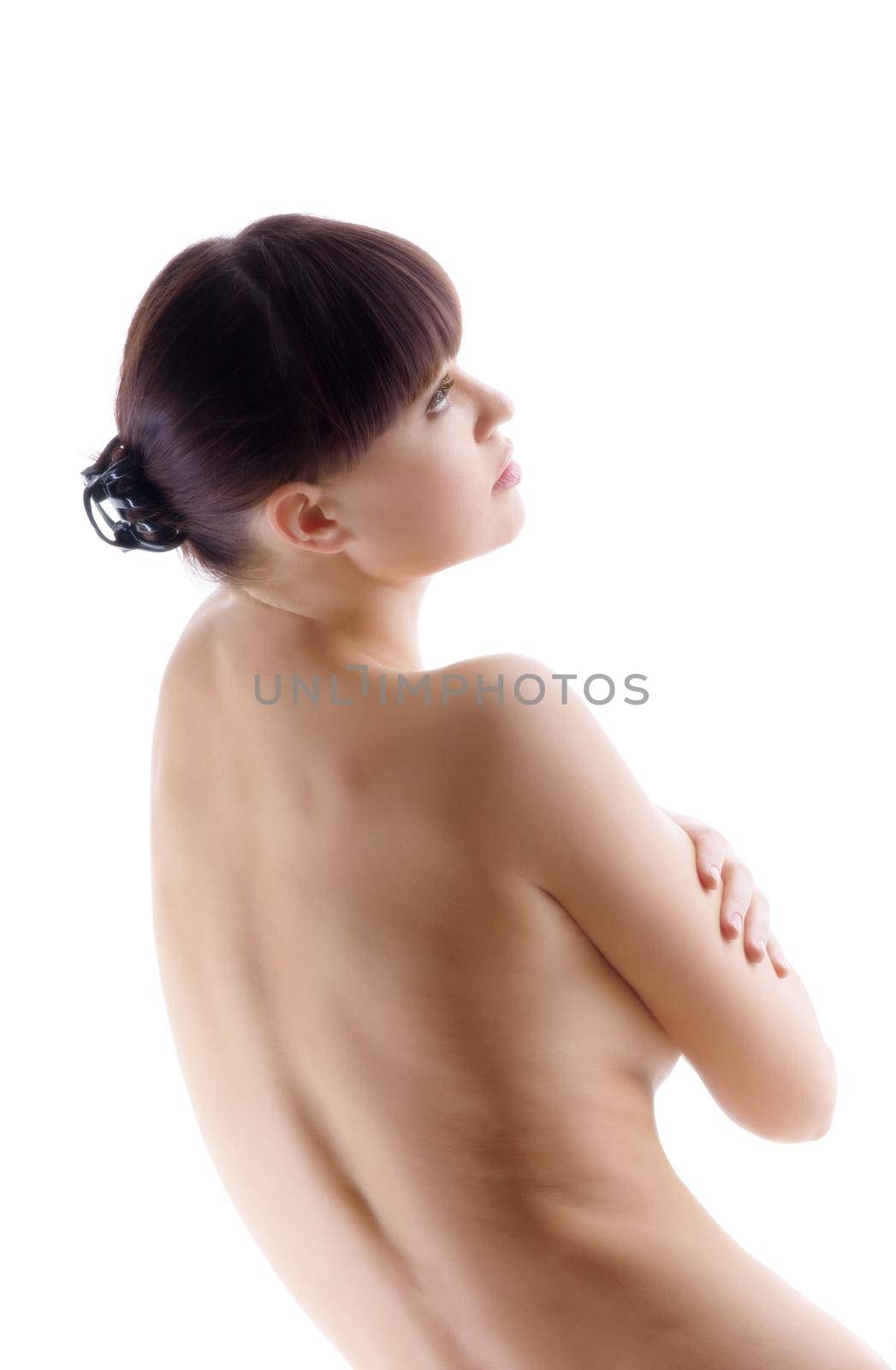 Beauty nude woman posing on white - take shoulders