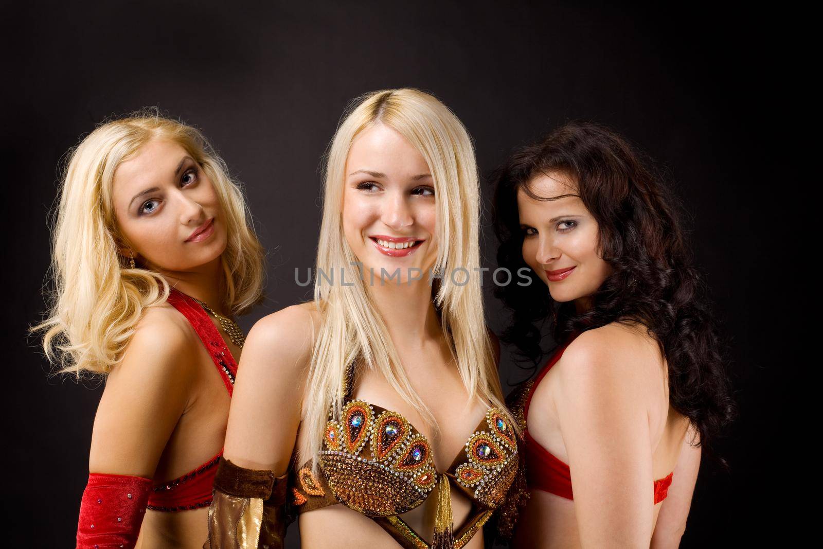 Three young girl look at you - arabic costume