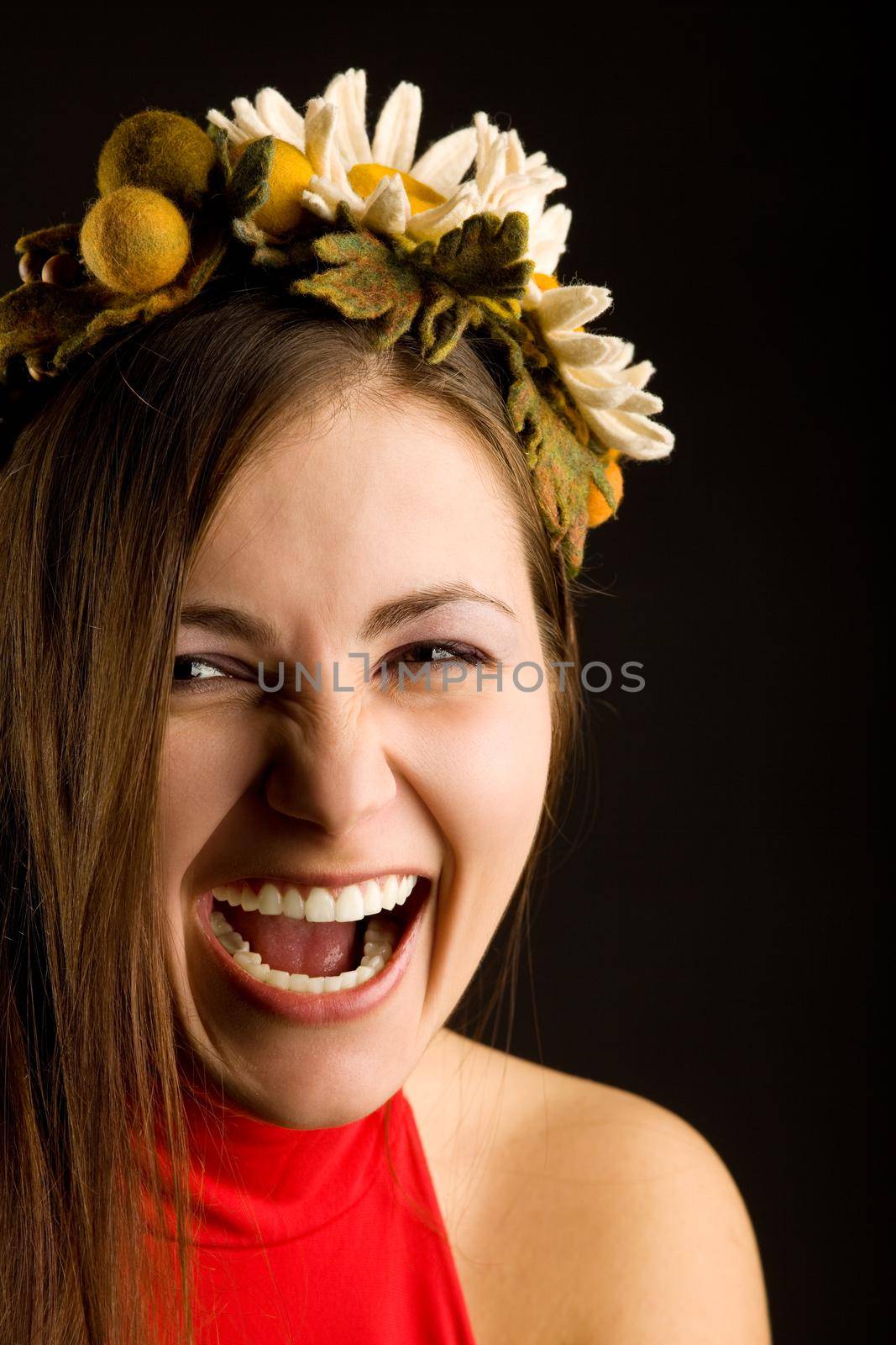 Portrait of smile young pretty woman with wreath