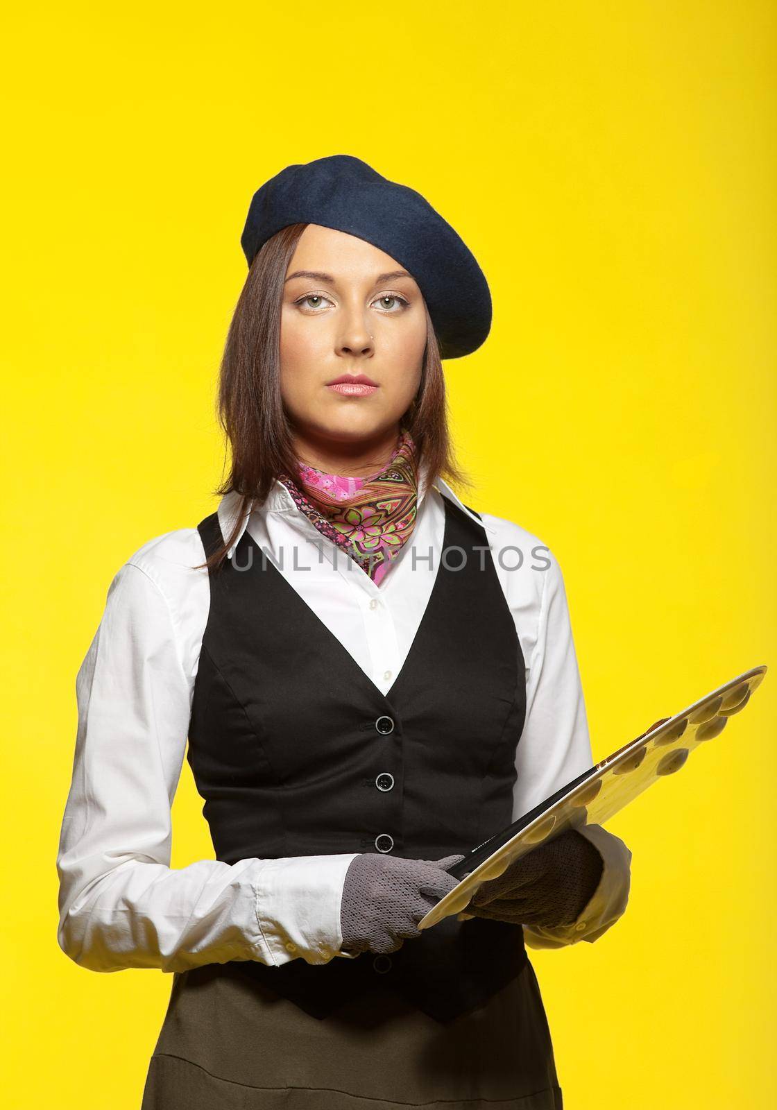 Young artist retro style cloth with brush on yellow background