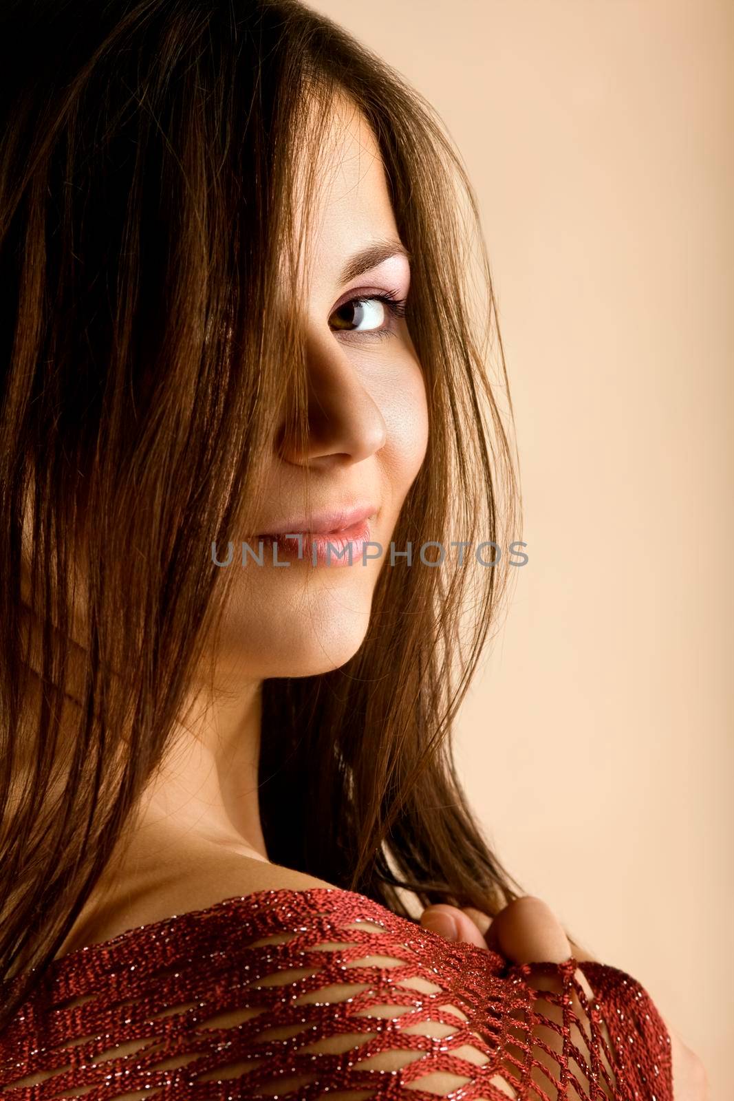 Portrait of young pretty woman with red lace