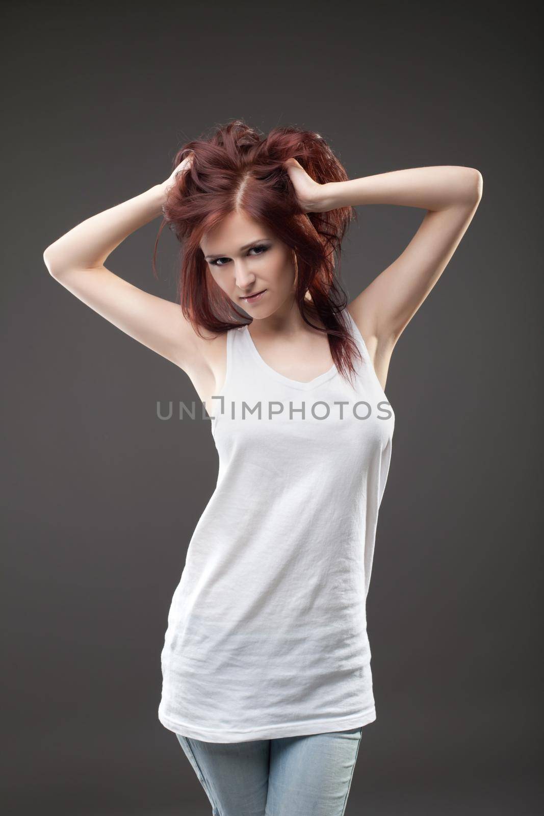 Attractive woman in tank top posing portrait by rivertime