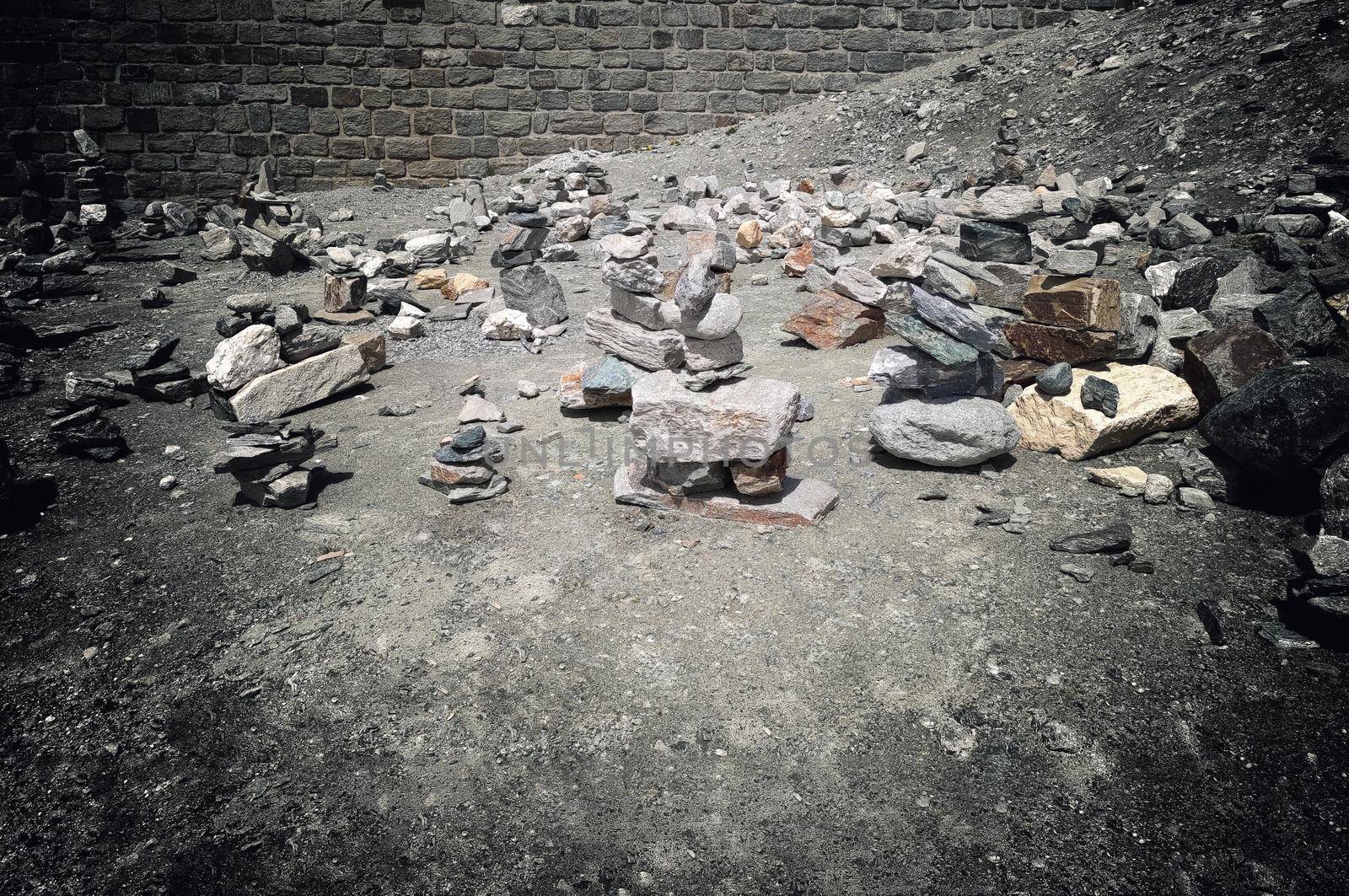 Stack of stones on top of the mountain arranged for meditation. by gnepphoto