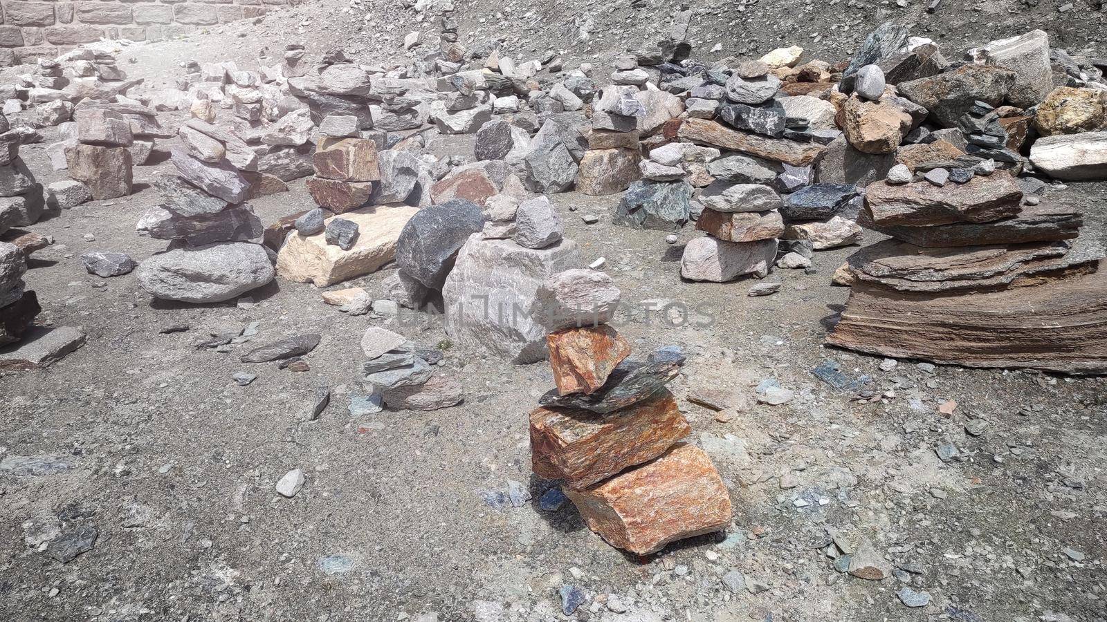 Stack of stones on top of the mountain arranged for meditation. by gnepphoto