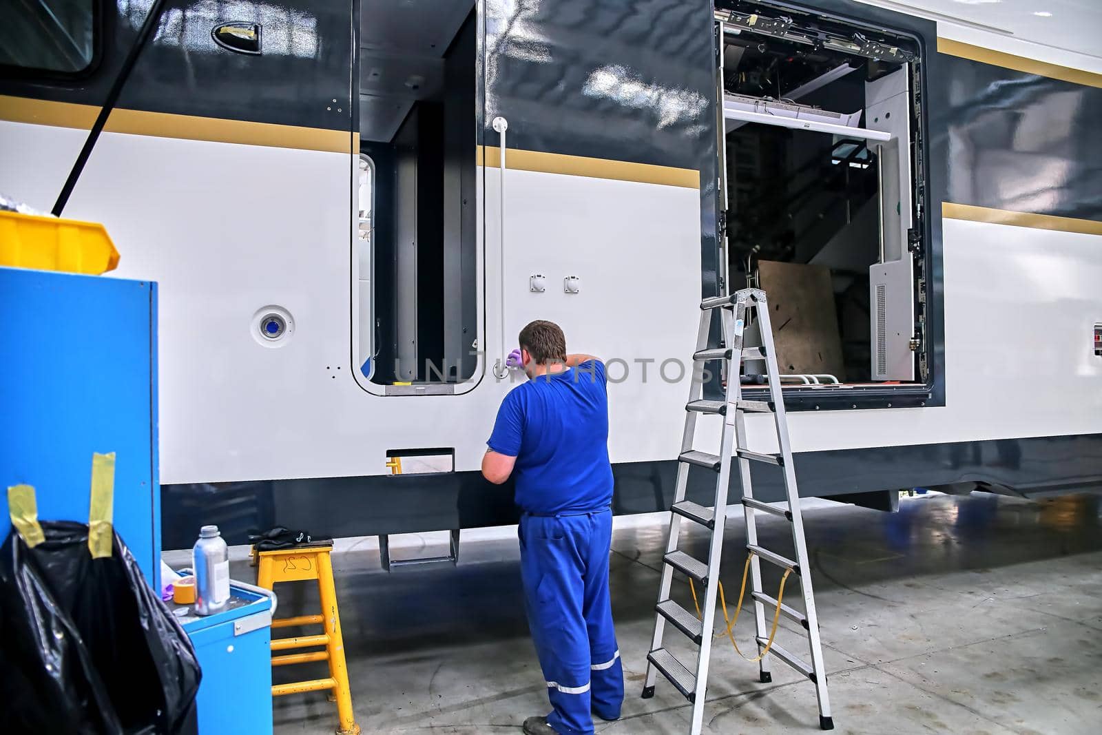 Inside the carriage assembly plant. Production workshop for the production of high-speed trains. Plant for the manufacture of rolling stock of trains.