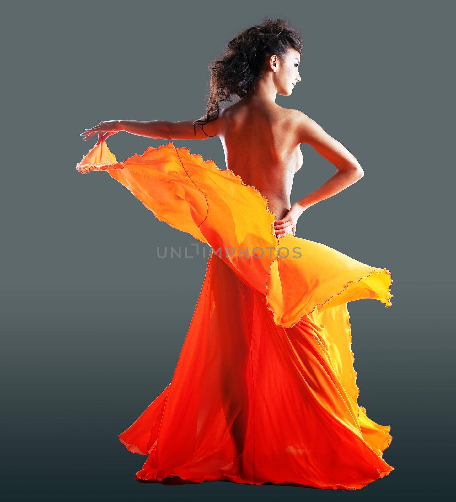 beauty naked woman dance in orange veil by rivertime
