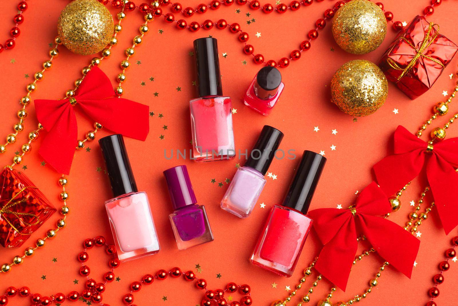 Nail polish in a New Year 's layout . New Year's gift cosmetics. The layout of the new year. by alenka2194