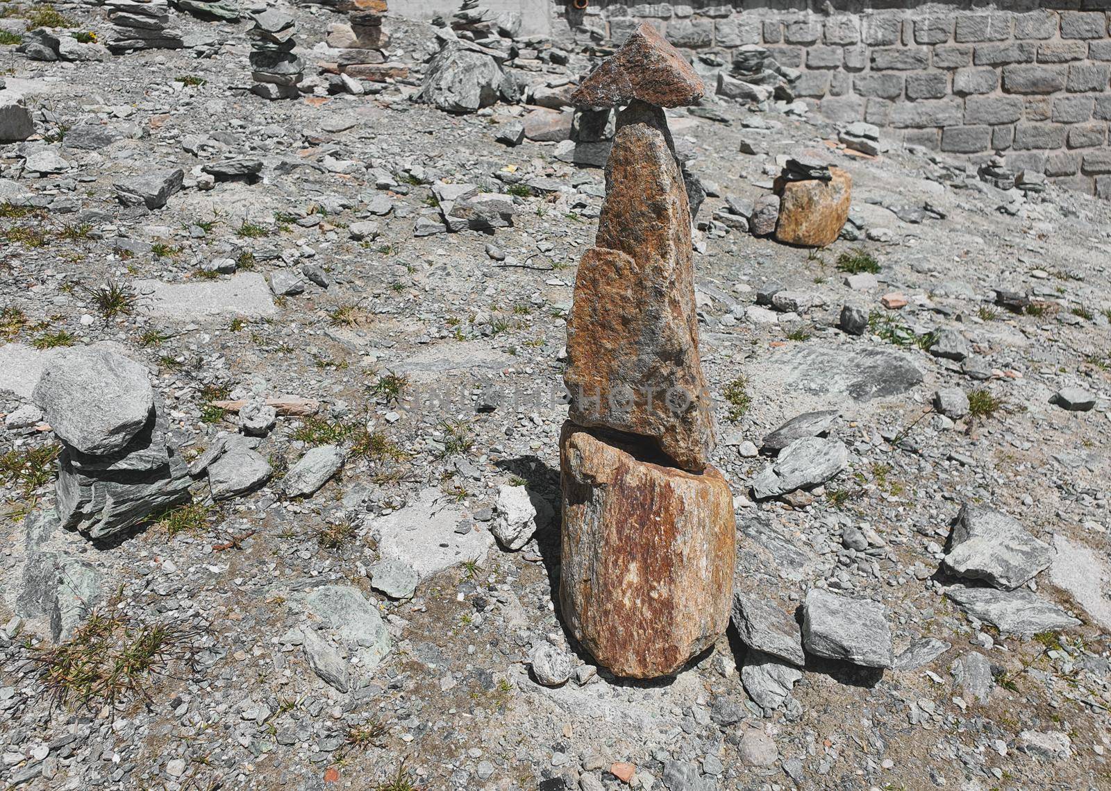 Stack of stones on top of the mountain arranged for meditation. by gnepphoto