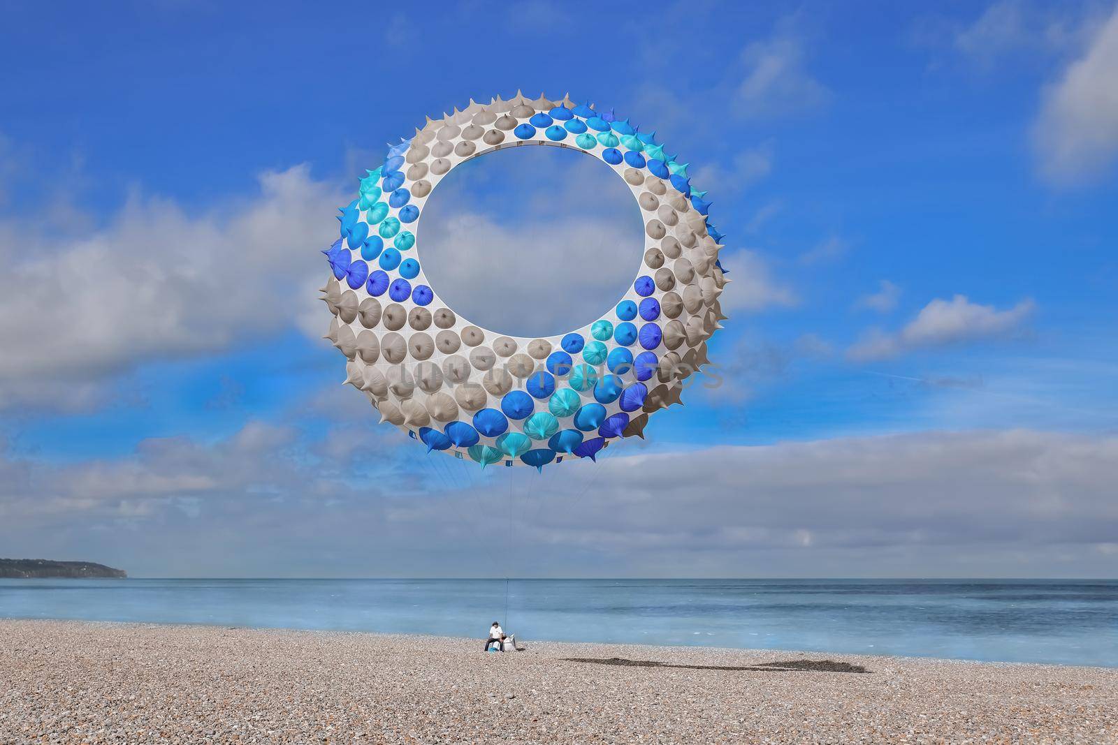 Blue air kite at the Atlantic ocean