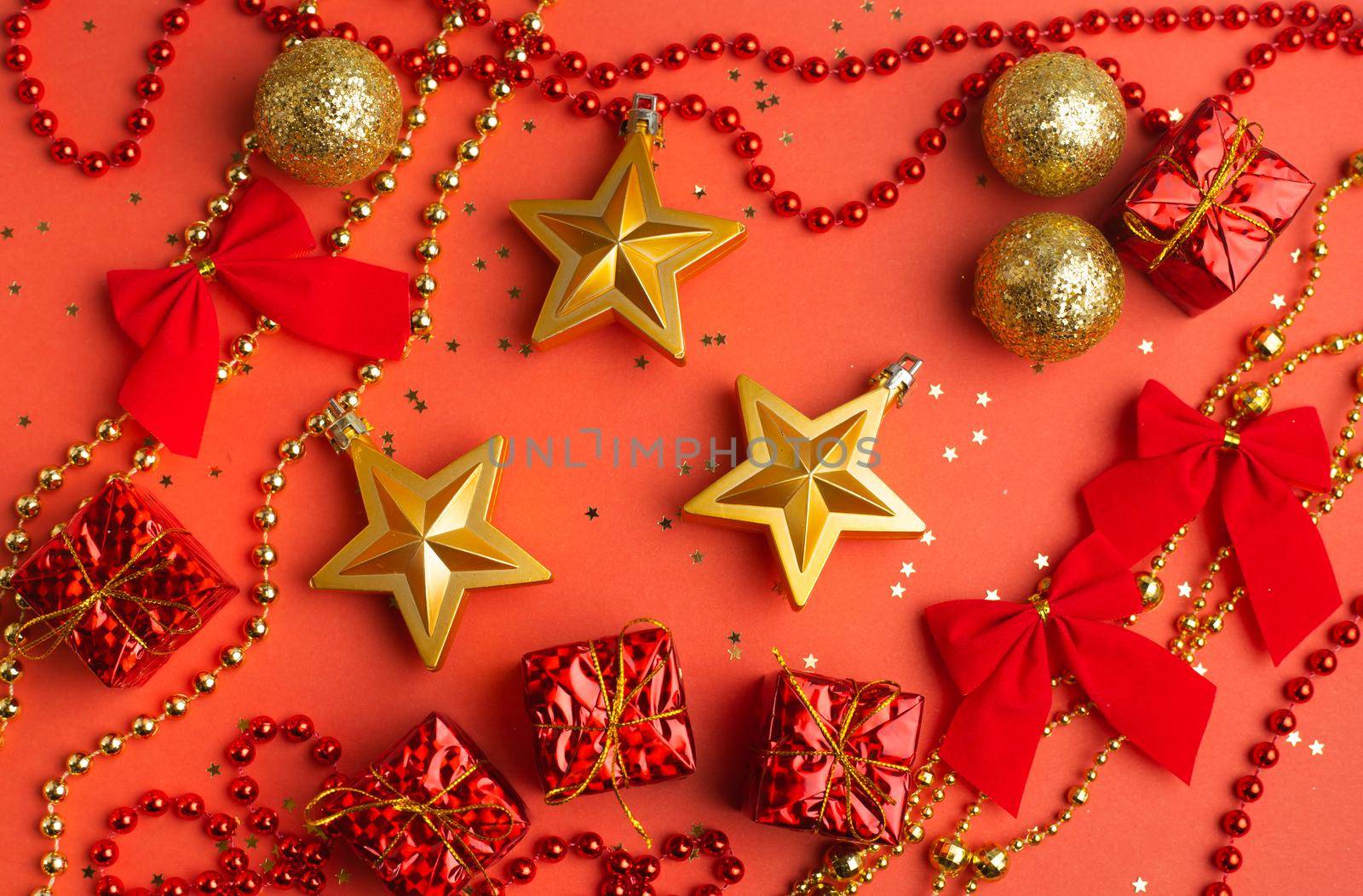 New Year 's layout on a red background with balloons . New Year and Christmas copy space. . Festive decoration. Christmas balls