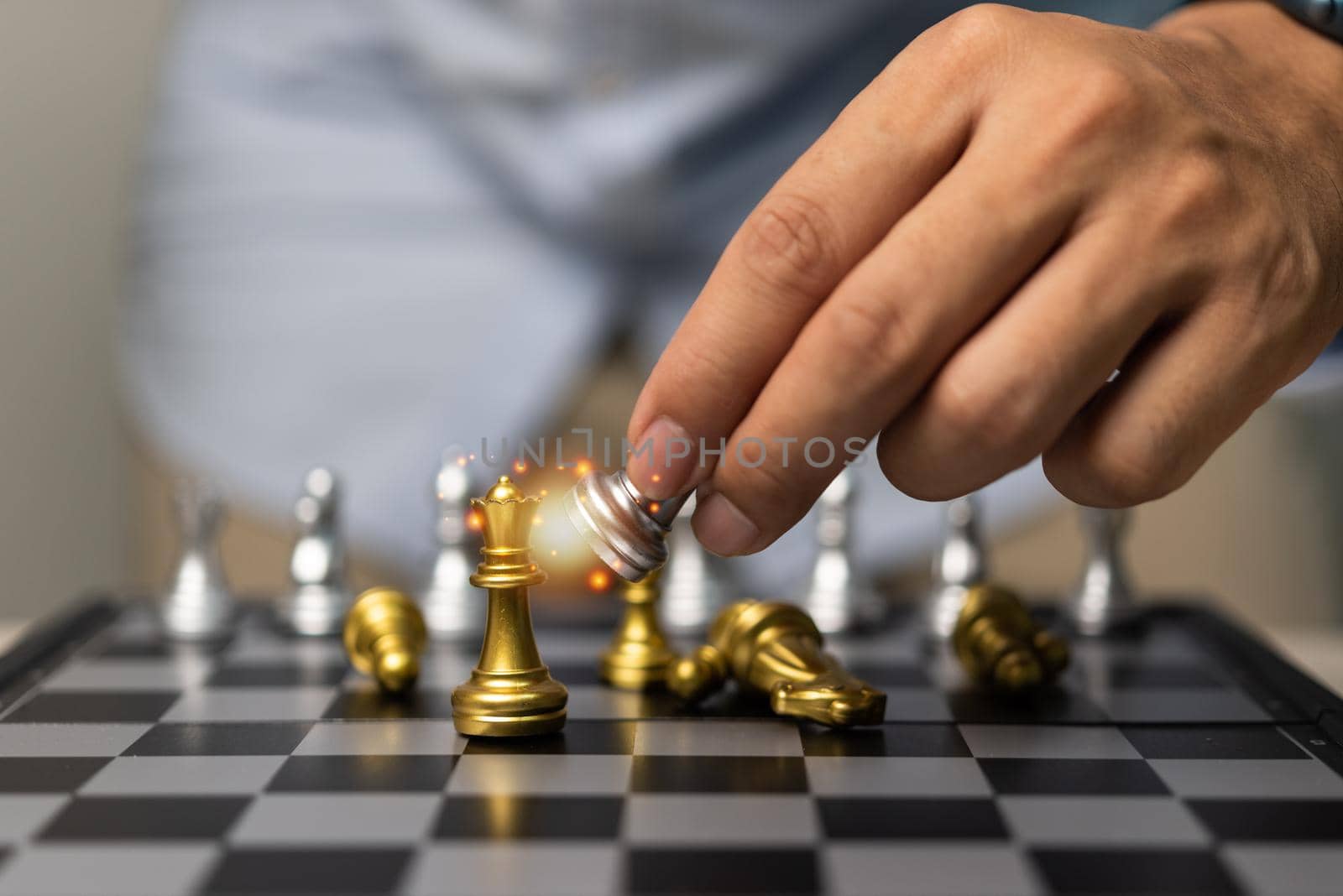 Hand man holding chess in game.Idea planning strategy marketing business concept. by aoo3771