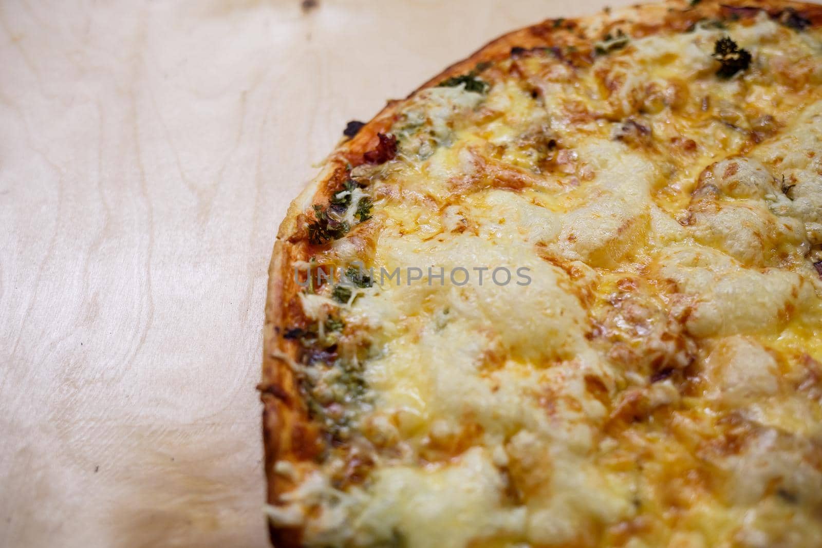 Home cooked pizza on a wooden board