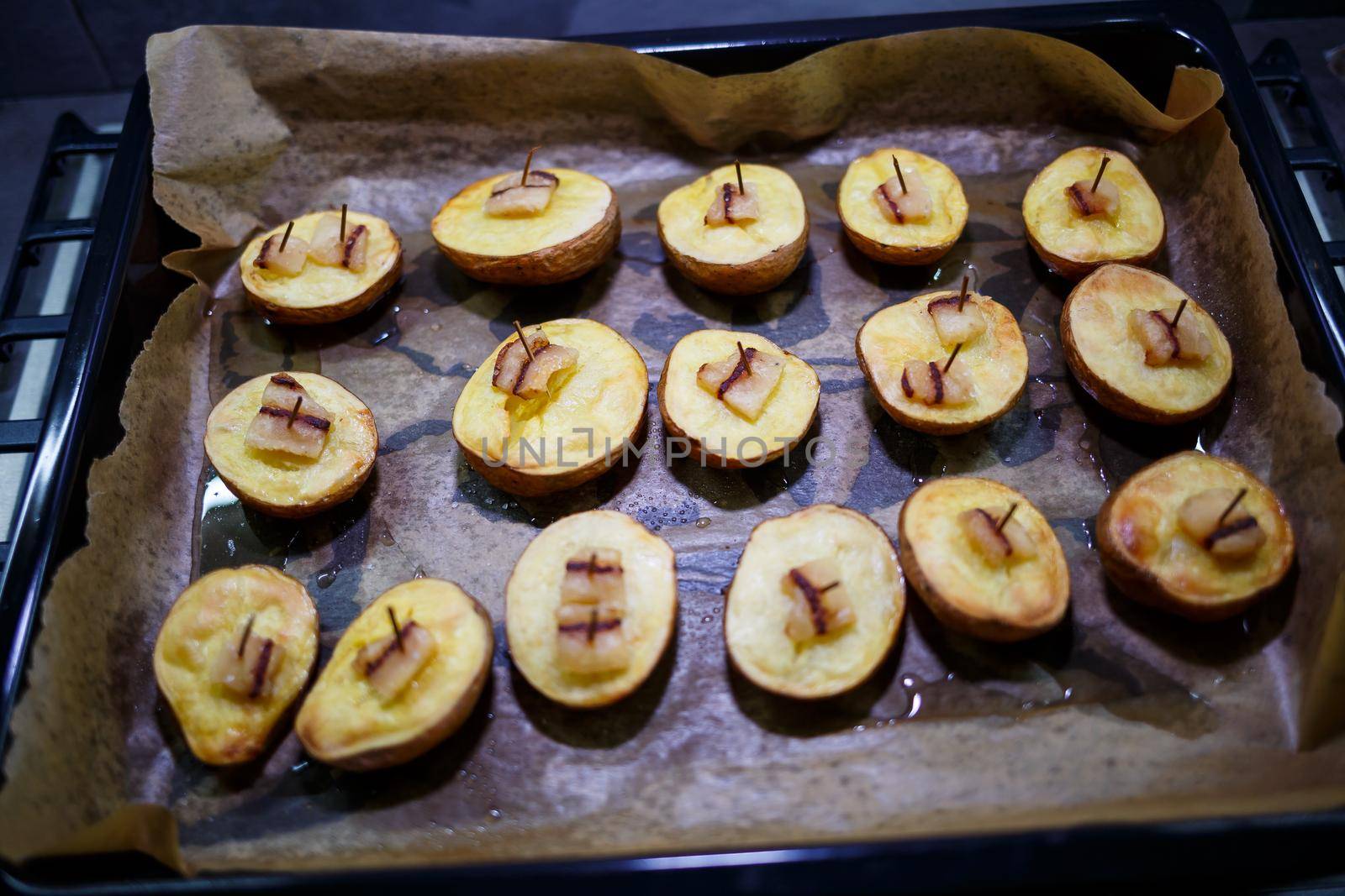 Baked chopped potatoes with lard
