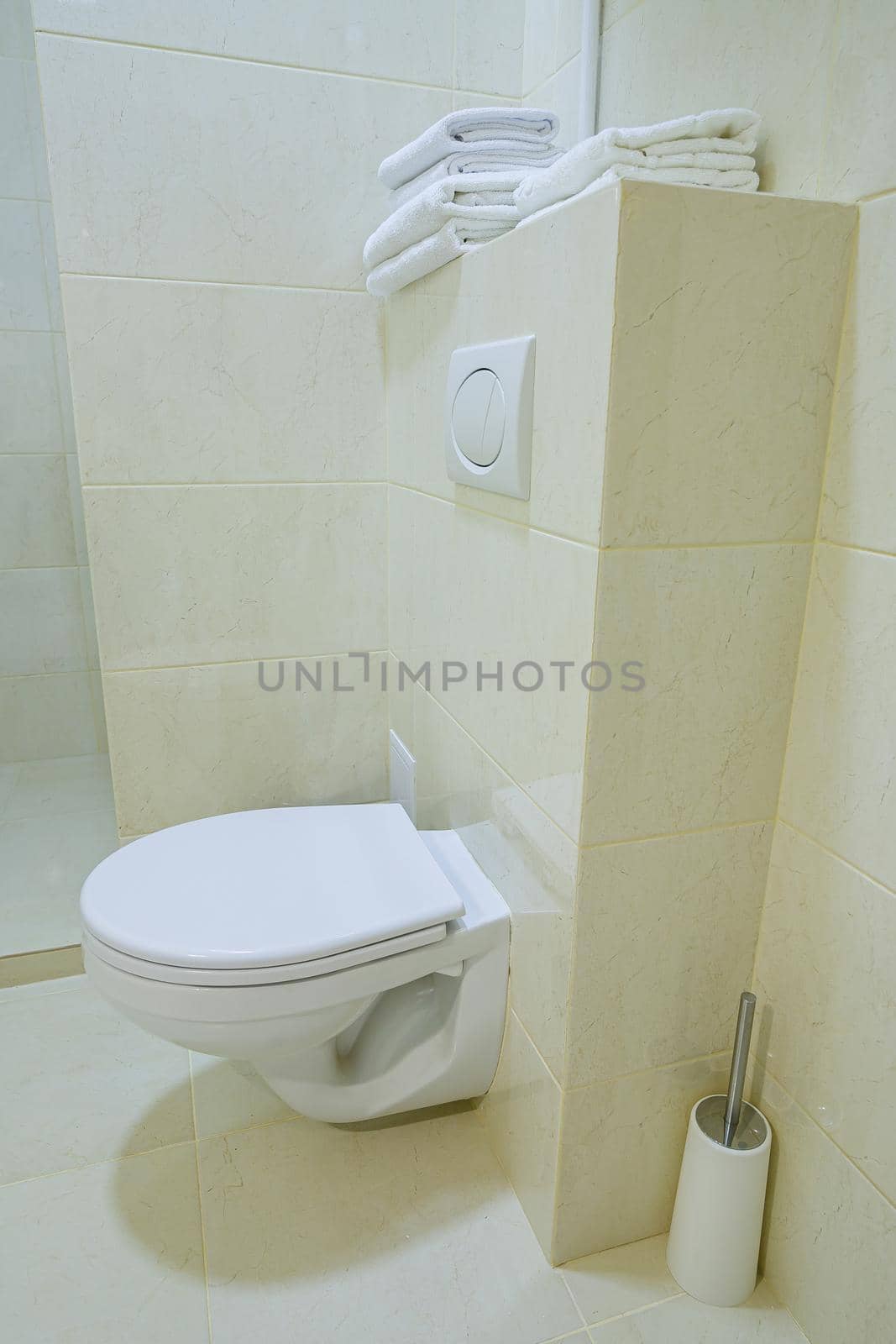 Bright bathroom, white toilet, washbasin, mirror, shower