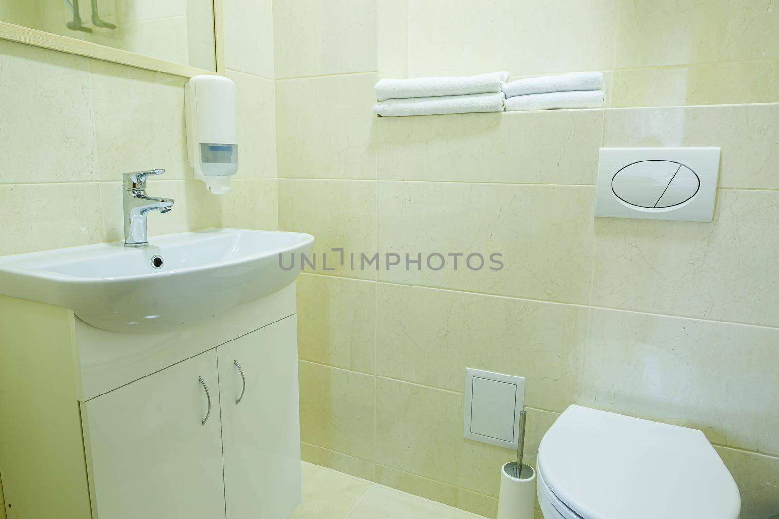 Bright bathroom, white toilet, washbasin, mirror, shower