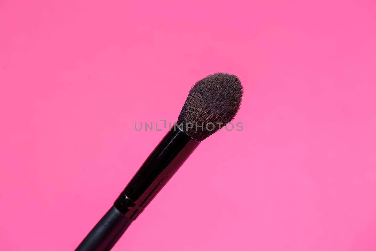 Makeup brush for eyes. Eyeliner. Sponge applicator for blending the pencil.