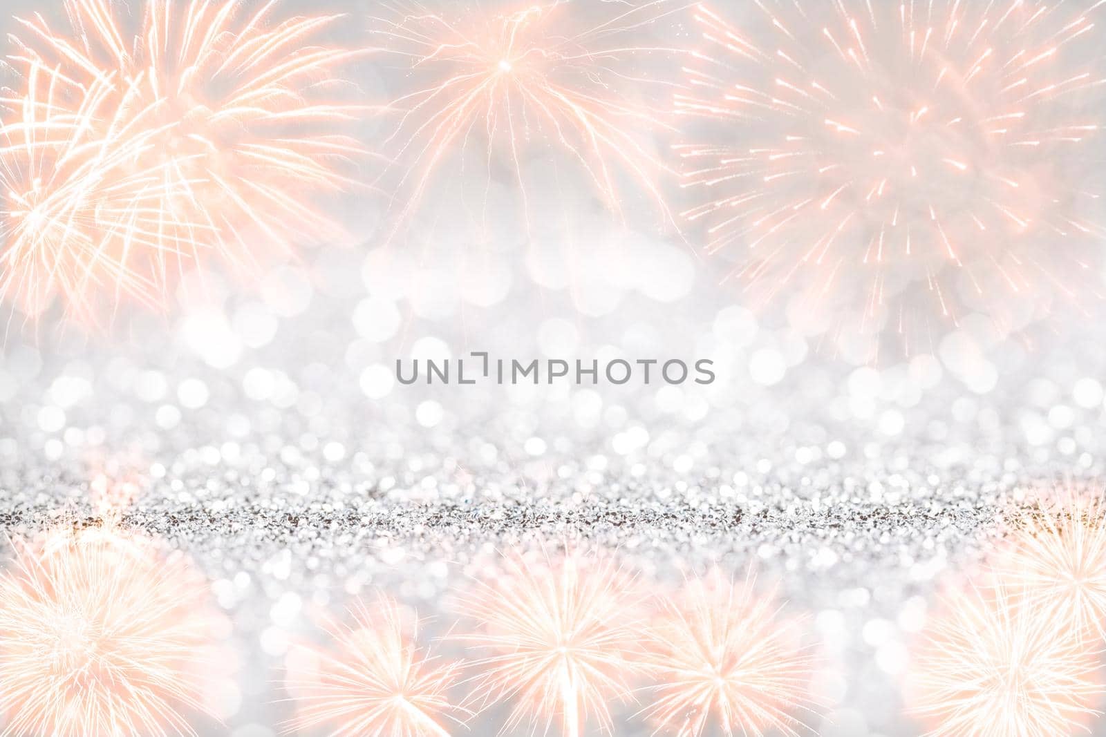 Bokeh gray background. Silver abstract bokeh snow falling winter christmas holiday background.
