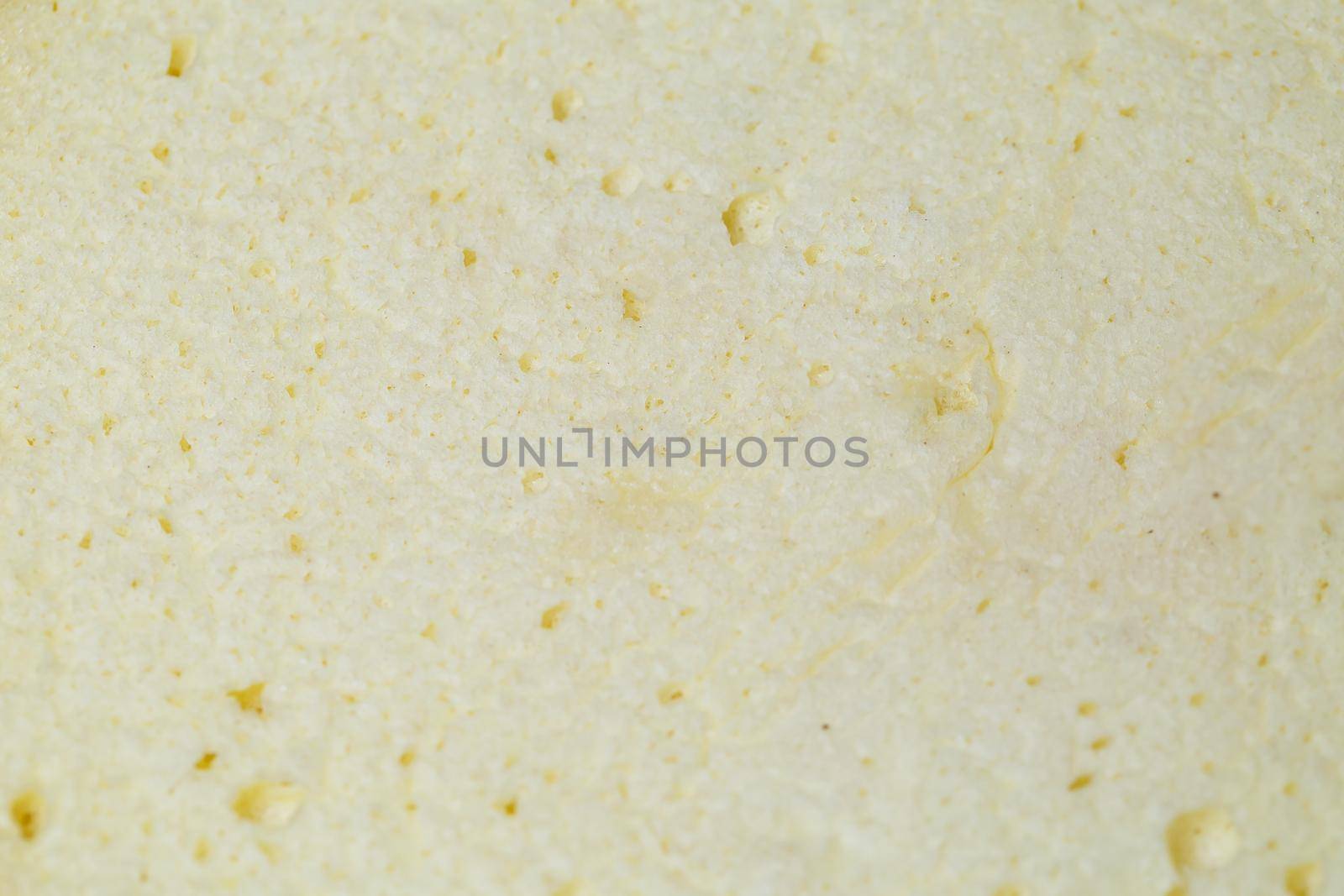 Freshly baked sponge cake with a golden brown crust.