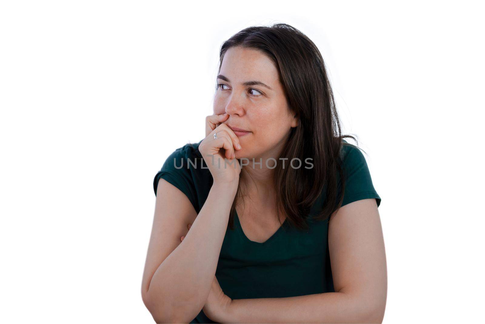 Young brunette long haired girl with finger in mouth looking at the floor thinking , isolated on white background