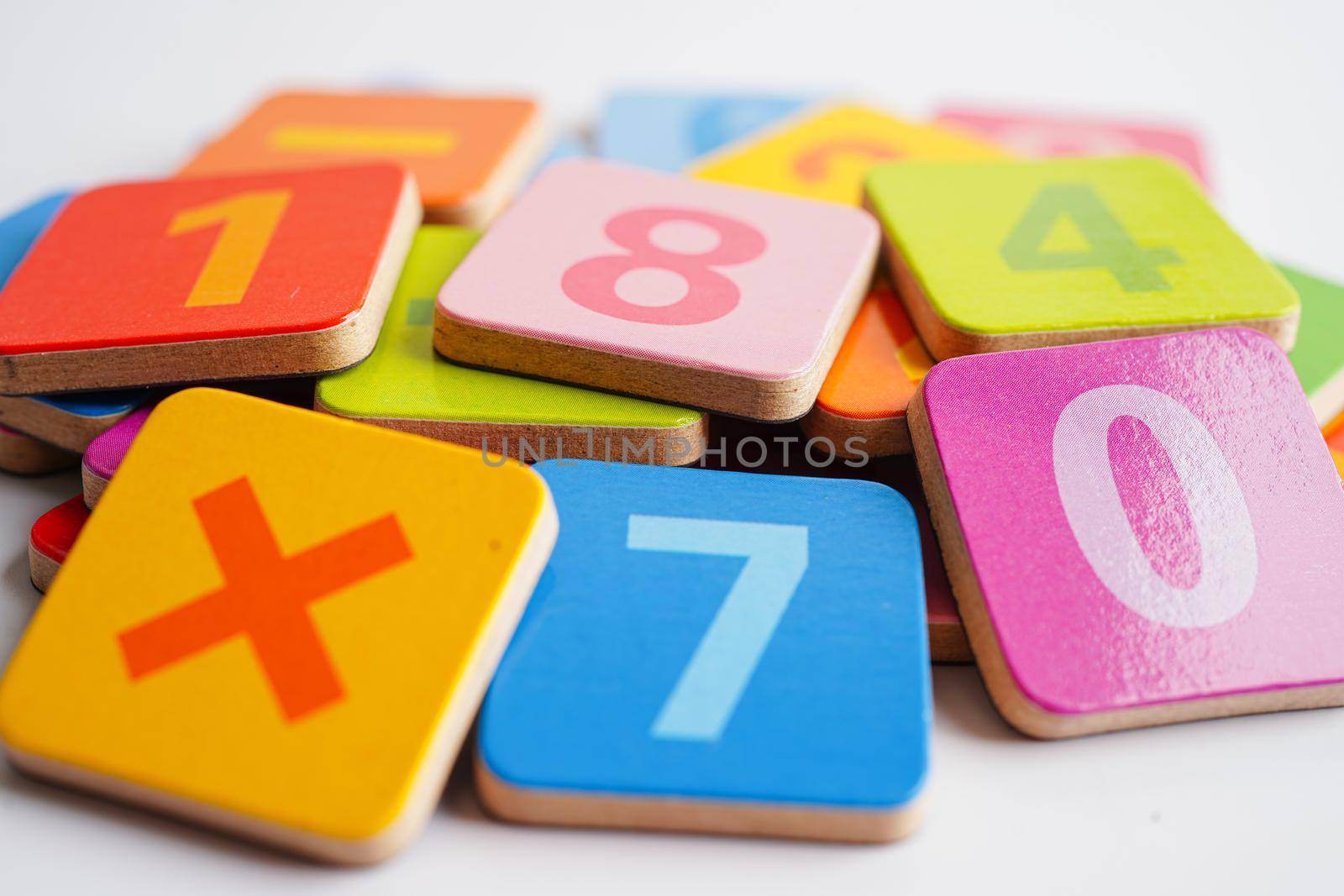 Number wood block cubes for learning Mathematic, education math concept.