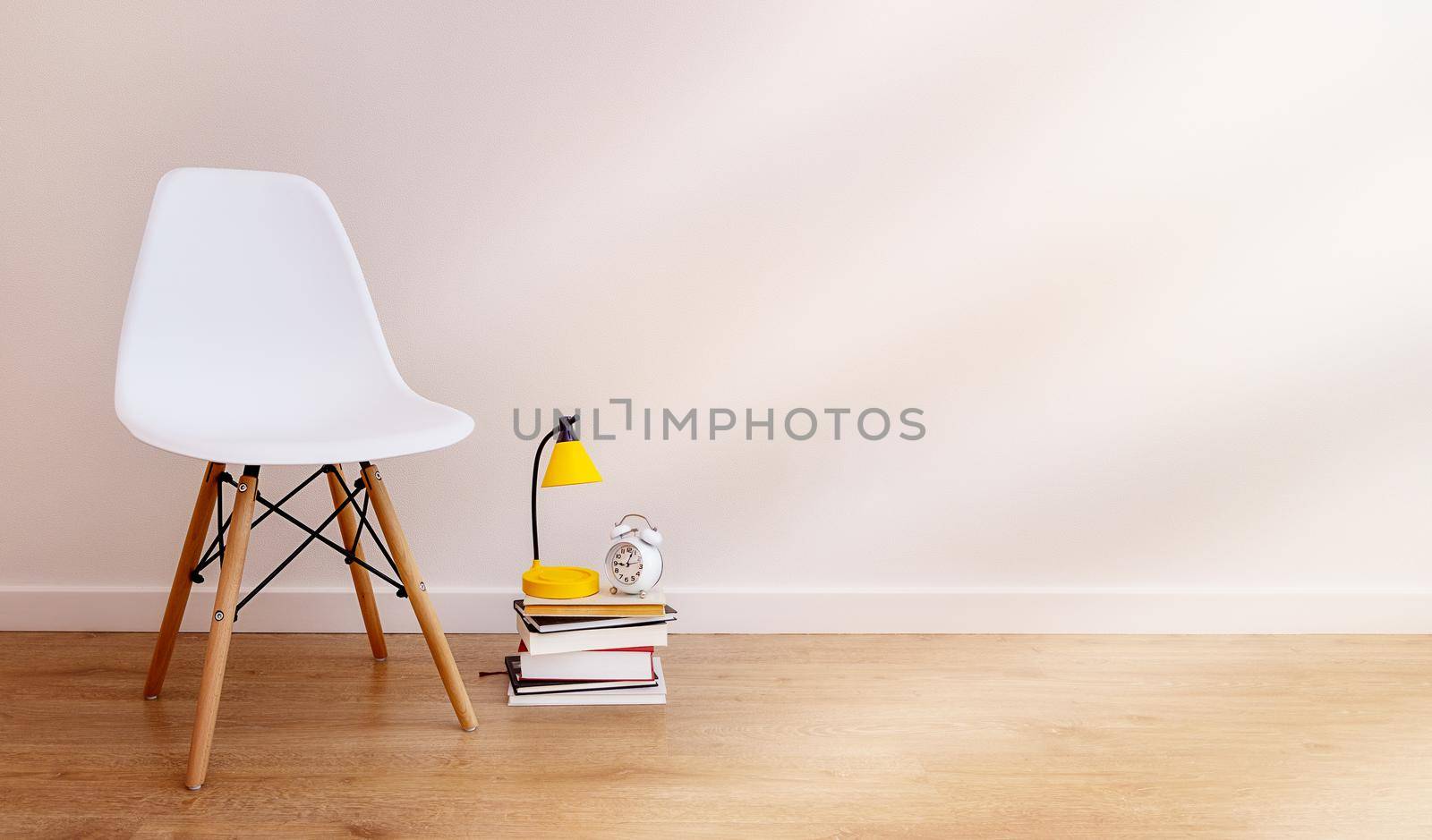 Long banner with empty, white copy paste space for design. white chair, books nearby, table lamp, alarm clock. The concept of home learning, online lessons. Sunbeams illuminate room from the window