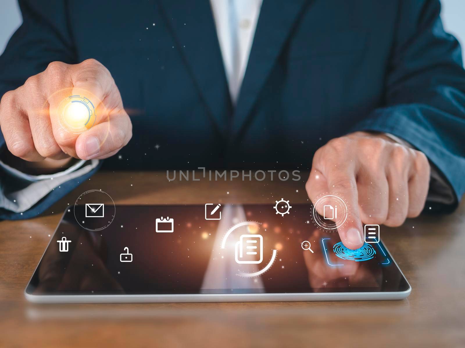 Hands of business man useing tablet use virtual screen E-commerce technology icons on virtual screen. Business global, social media marketing concept.