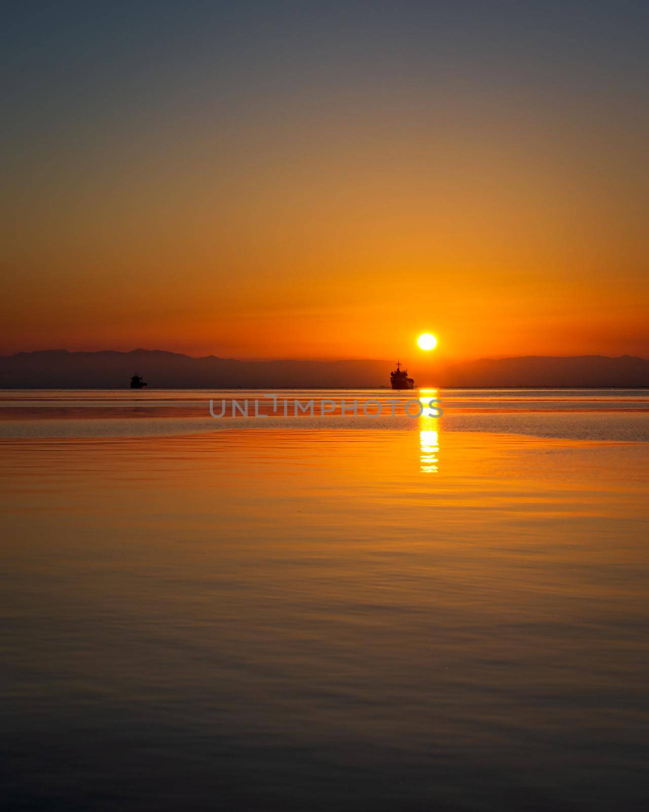 Beautiful sunset in Thessaloniki, Greece. Mediterranean coastline photo