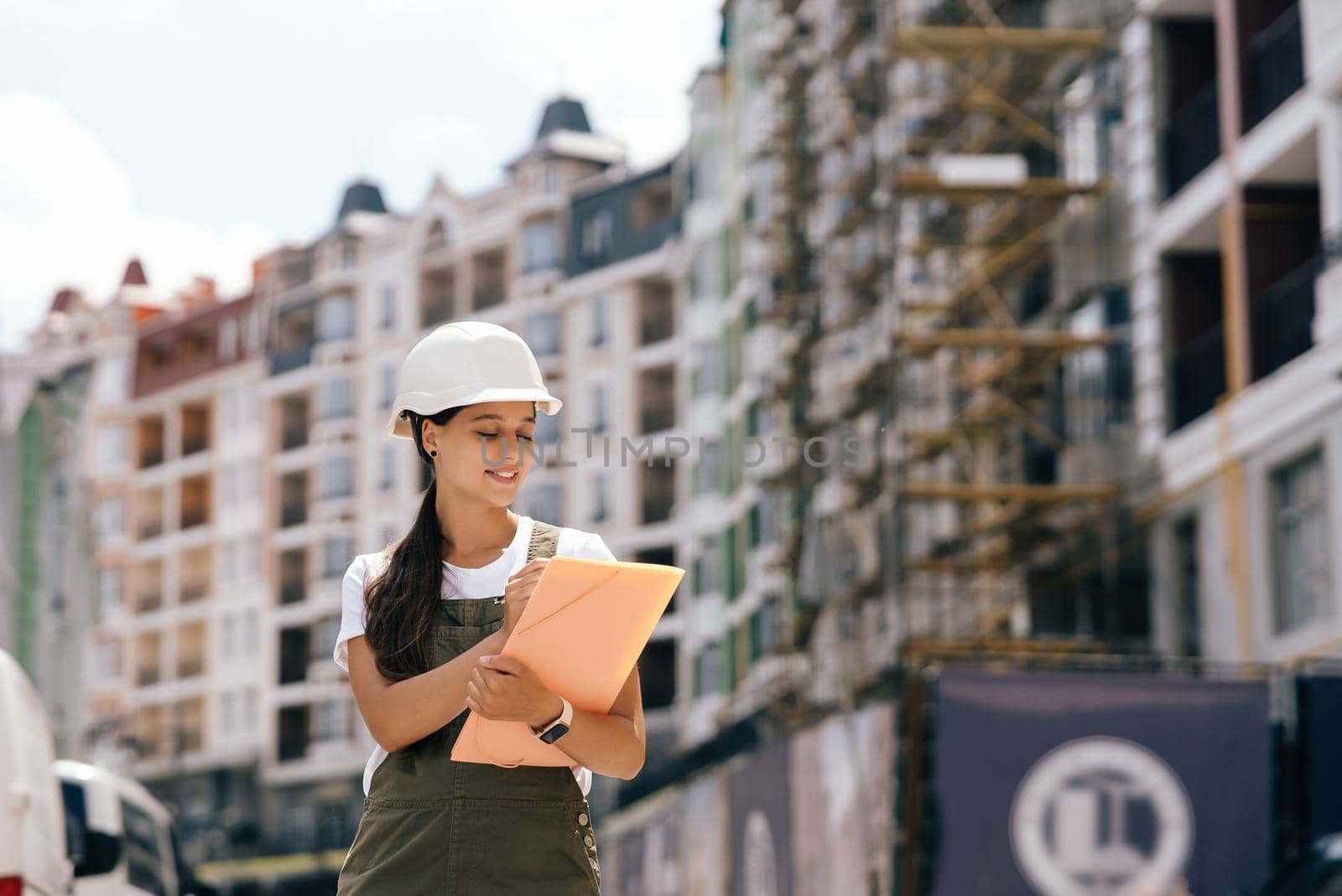 Woman construction engineer wear safety white hard hat at construction site industry worker. Woman construction Engineer concept