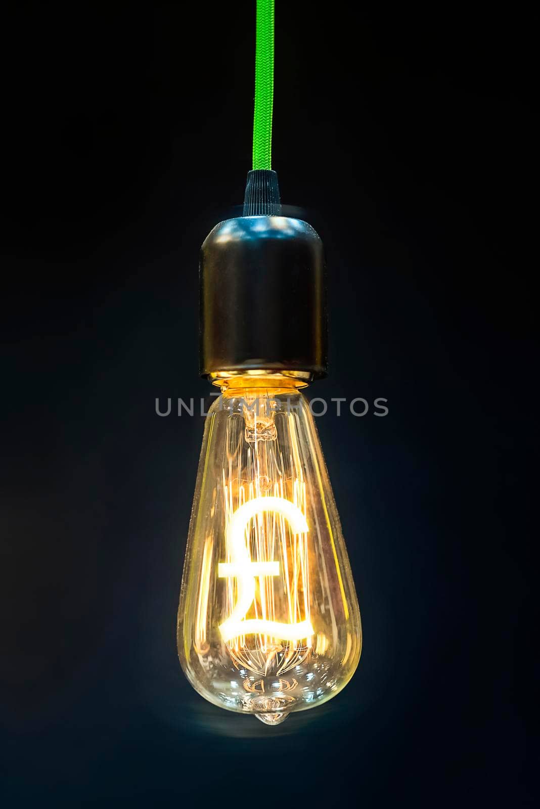 Money making idea. Light bulb with Pound sterling  symbol.