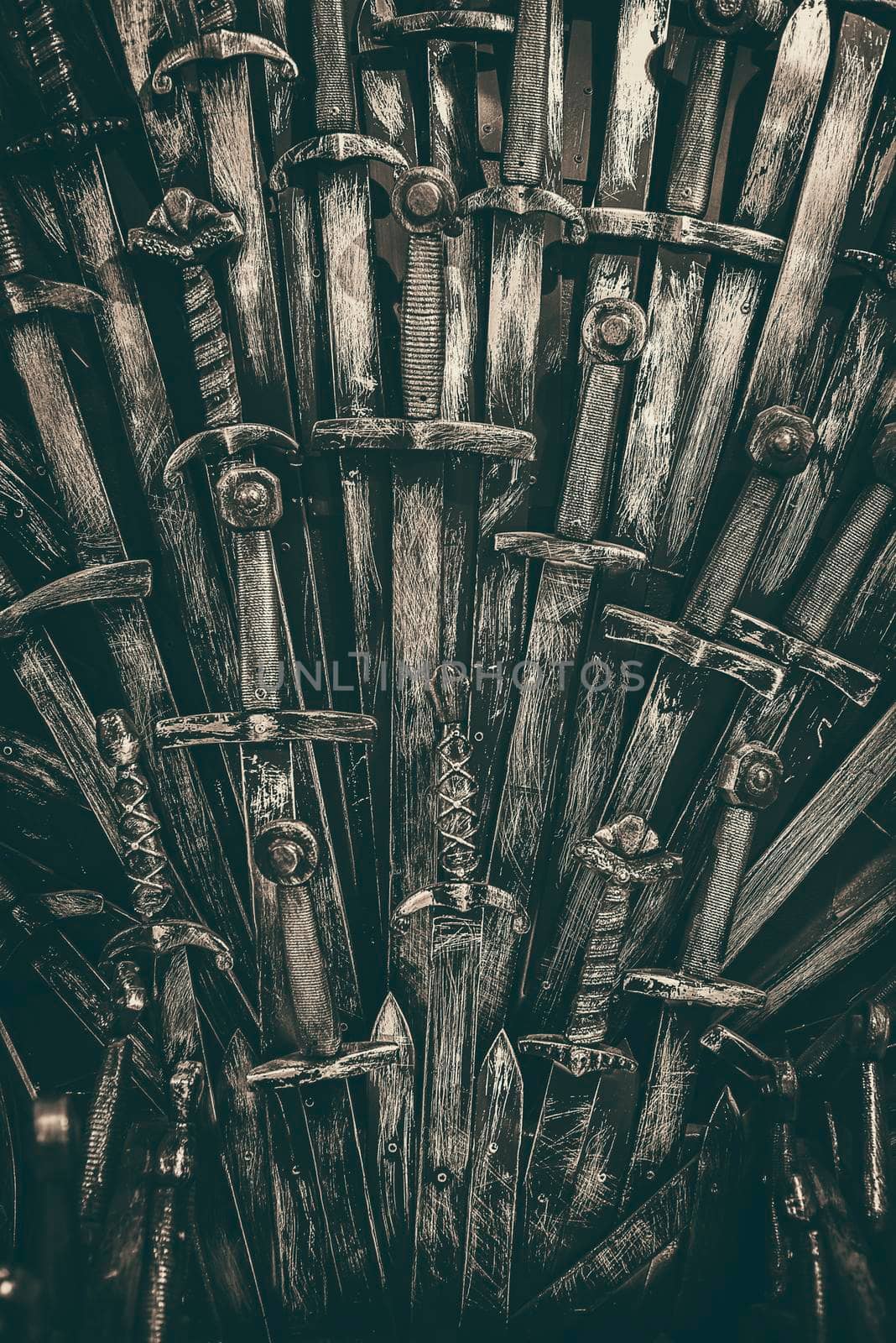 Metal knight swords background. Close up. The concept Knights.