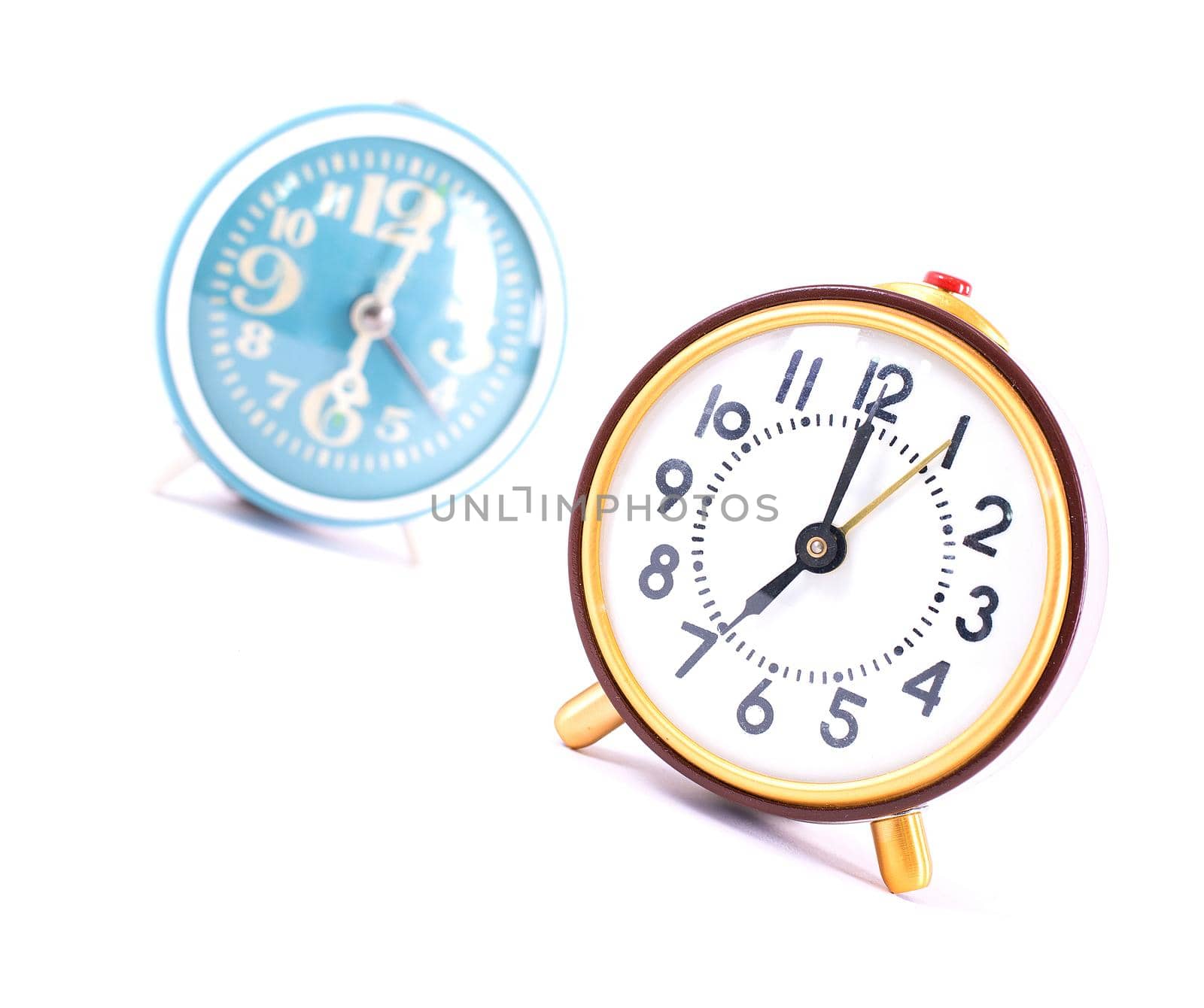 Retro clock isolated on white background. Close up.