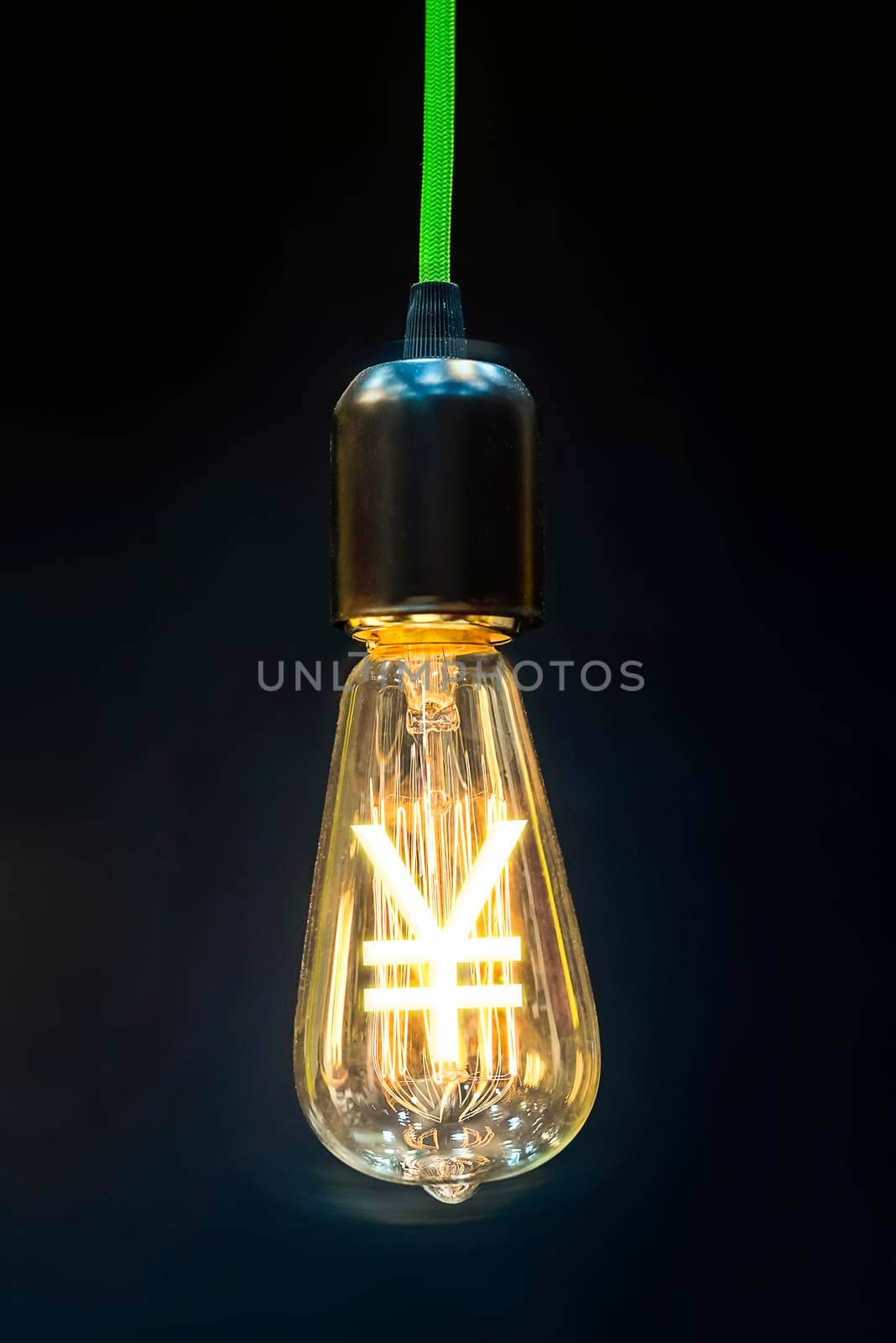 Money making idea. Light bulb with Japanese  Yen symbol.