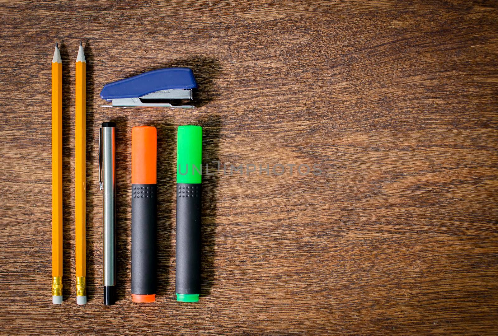 Pencils on an old wooden table table. close-up.