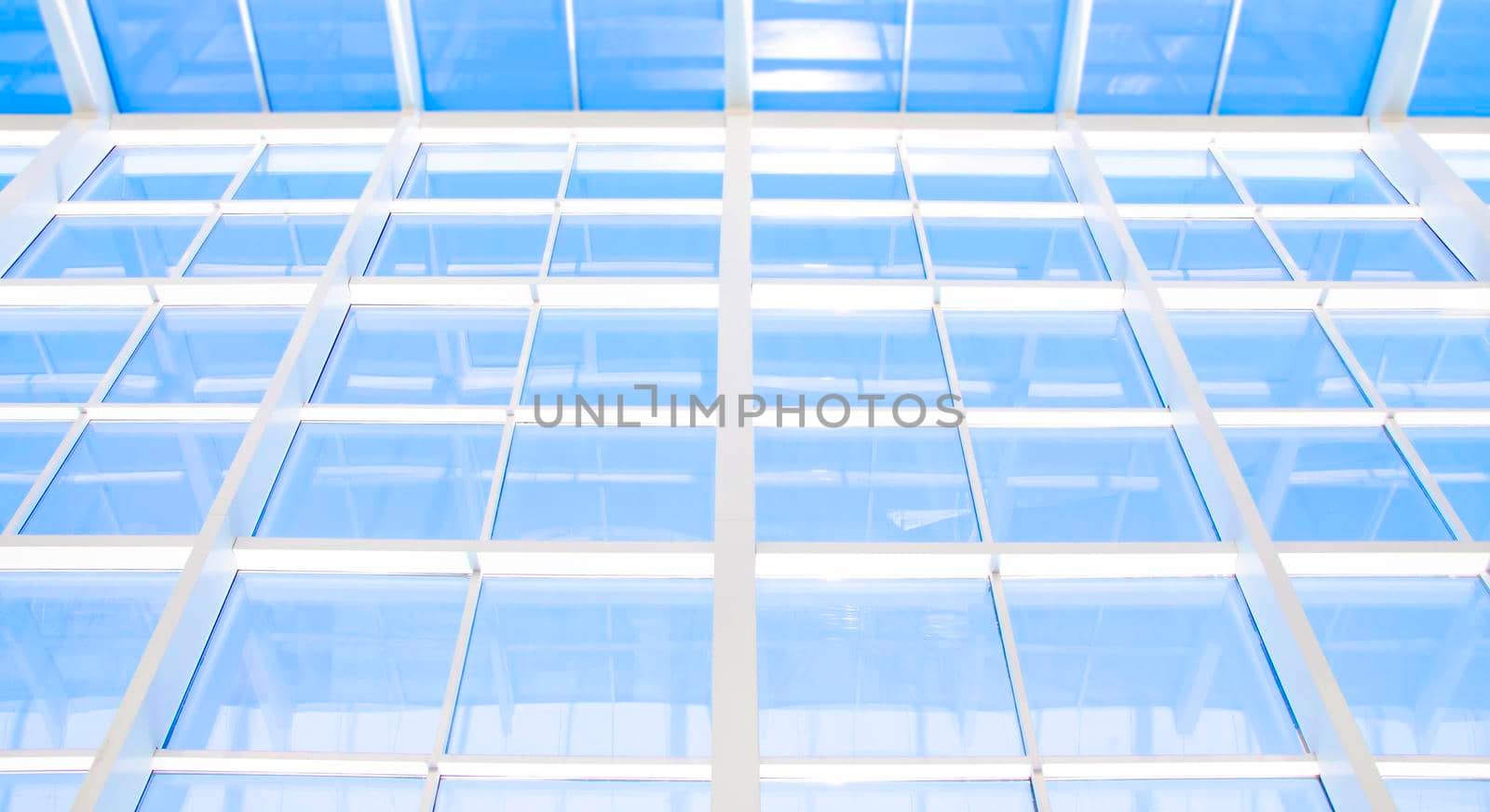 Geometric blue abstract background with triangles and lines.
