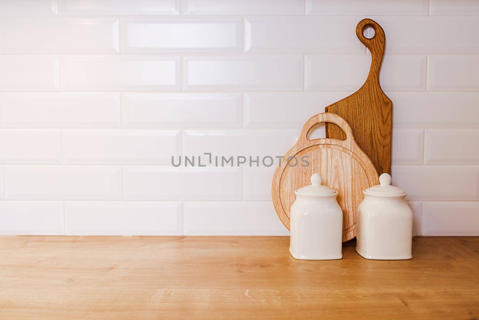 mockup, white wall background, wooden cutting boards and ceramic utensils by Ramanouskaya