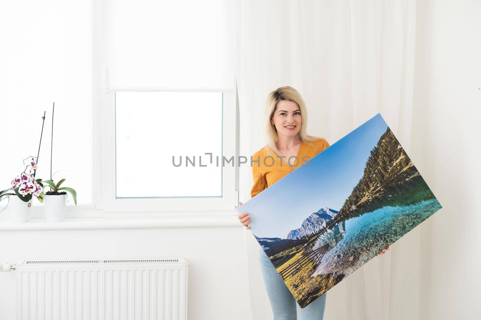 Canvas prints. woman holding photo canvas by Andelov13