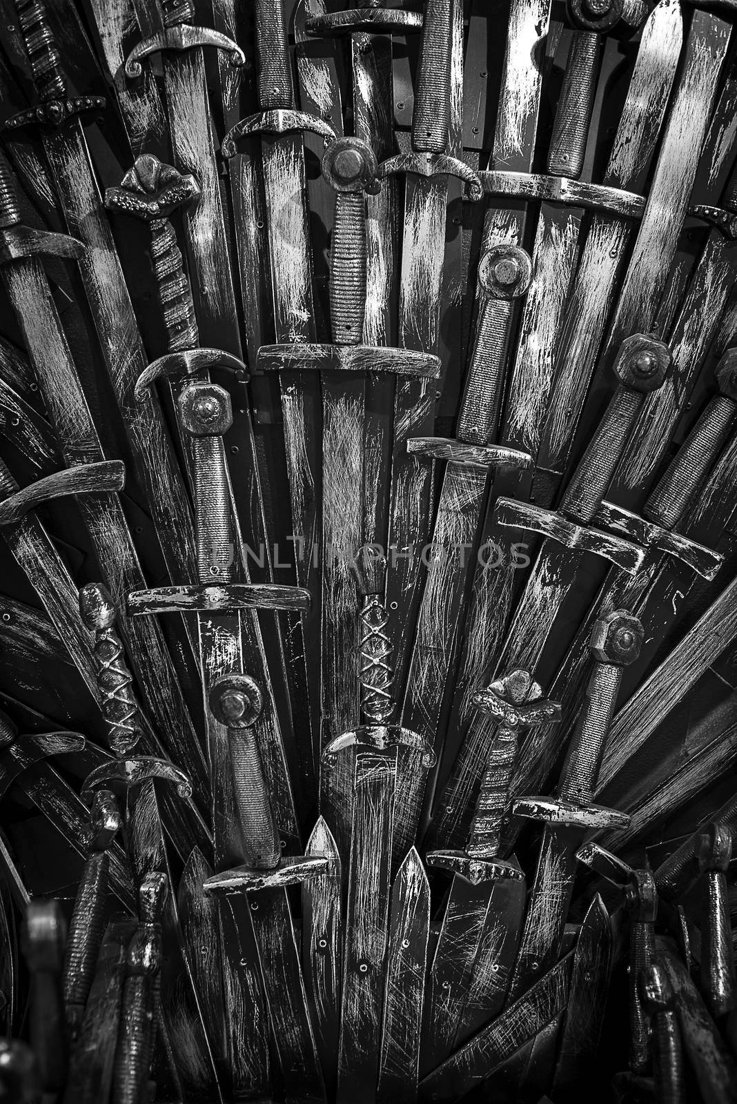 Metal knight swords background. Close up. The concept Knights.