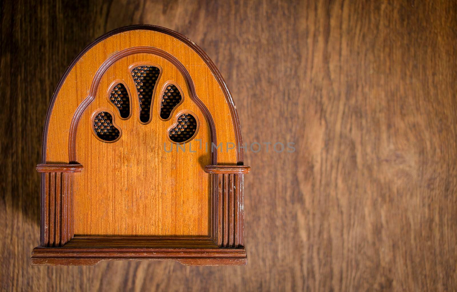 Retro radio on old wooden table table. close-up.