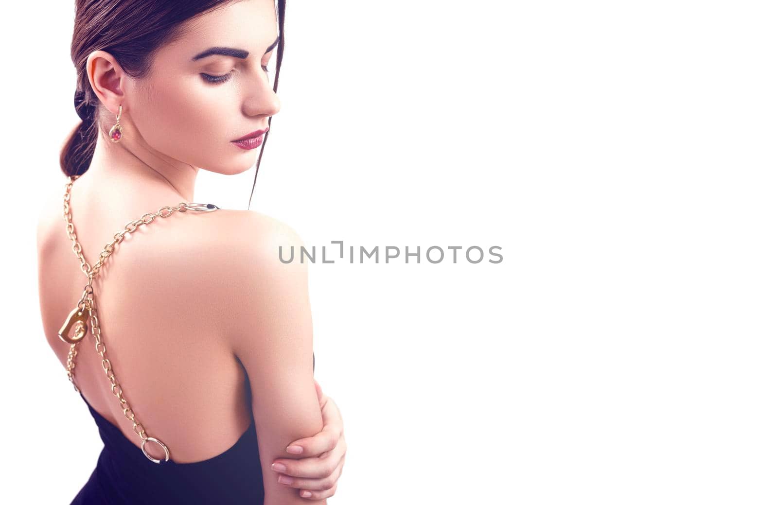 Portrait of nice young gorgeous woman on white backgrounds. To a lots of copy space.