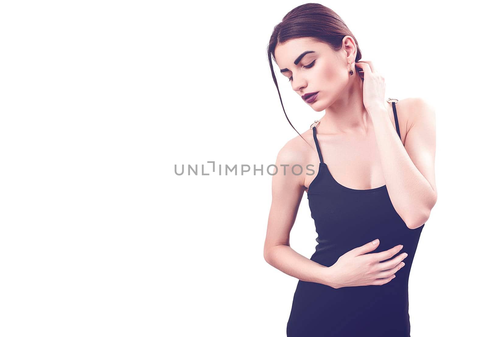 Portrait of nice young gorgeous woman on white backgrounds. To a lots of copy space.