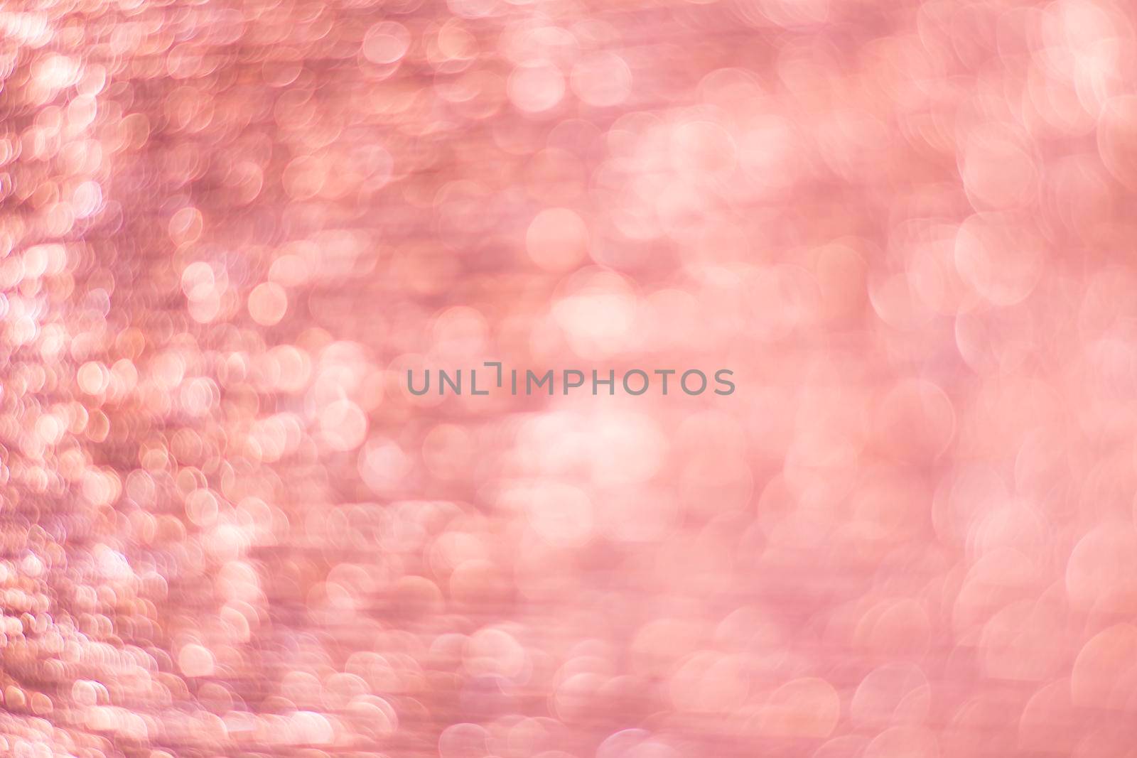 Pink bokeh. Abstract background. Defocused lights.