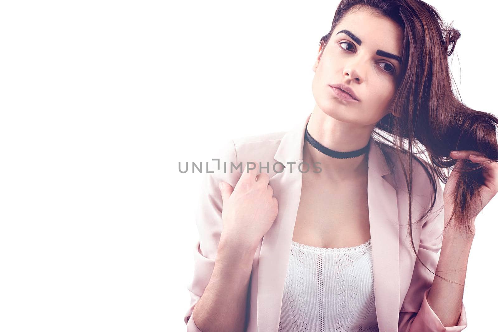 Portrait of nice young gorgeous woman on white backgrounds. To a lots of copy space.