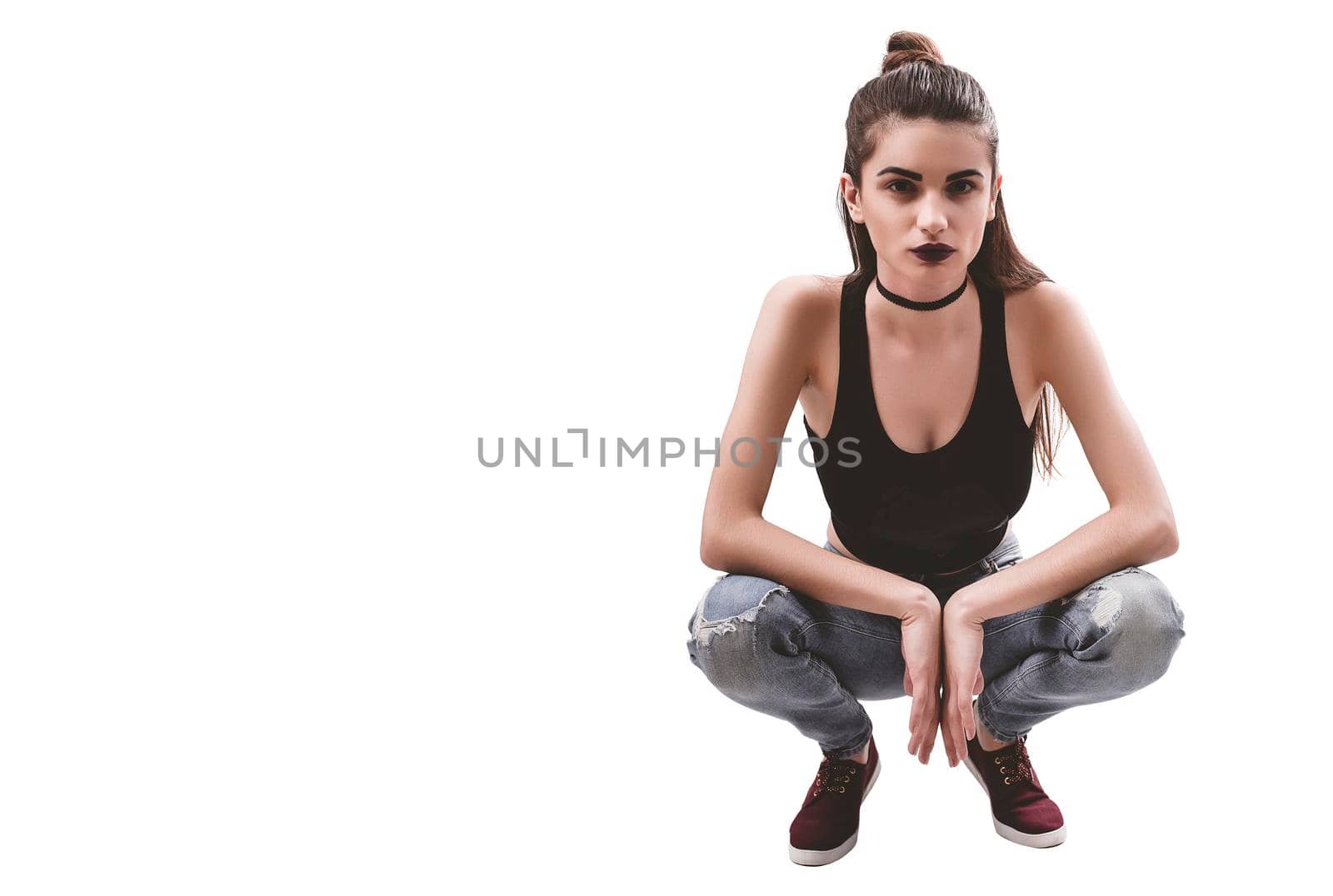 Portrait of nice young gorgeous woman on white backgrounds. To a lots of copy space.