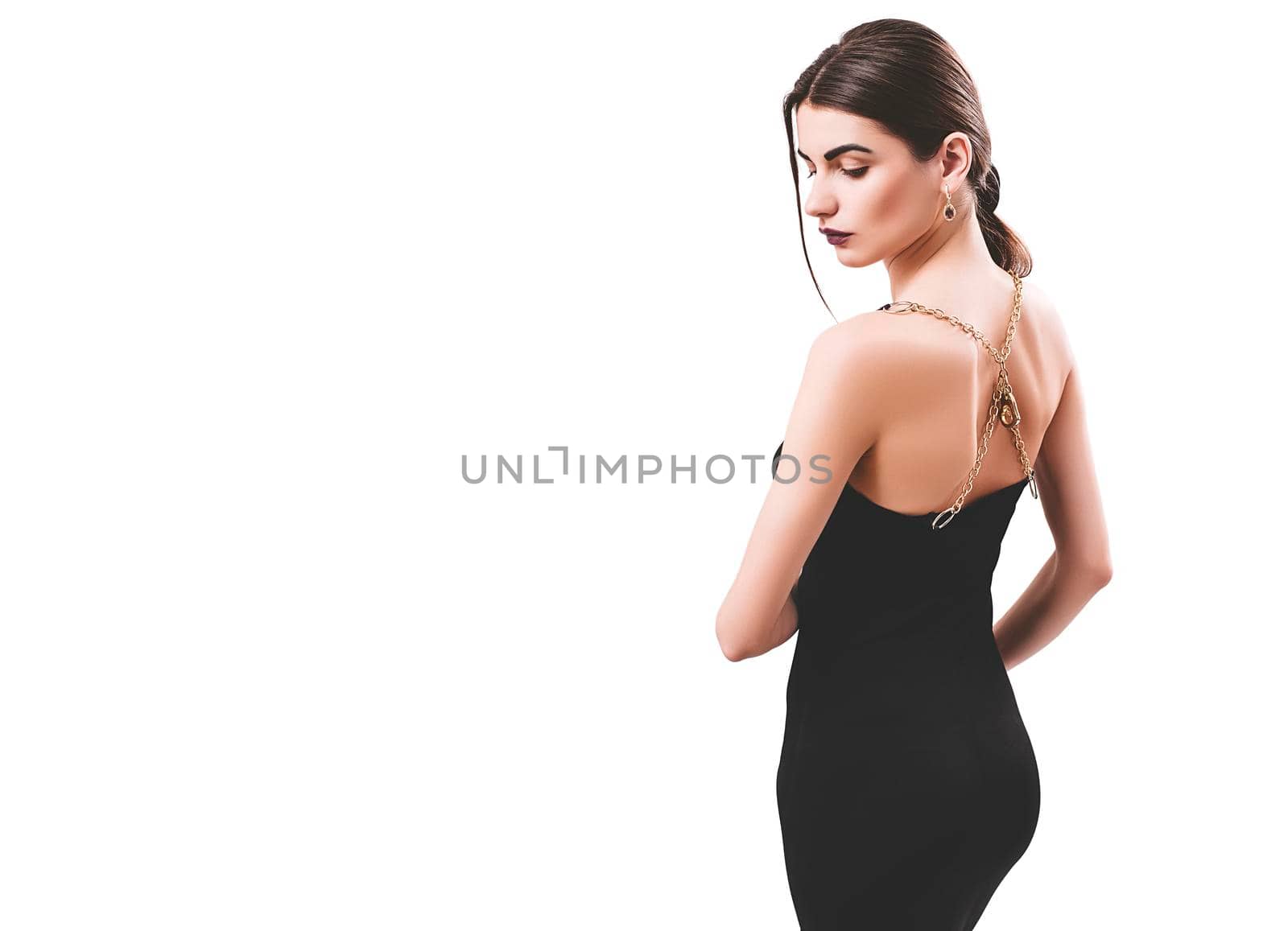 Portrait of nice young gorgeous woman on white backgrounds. To a lots of copy space.