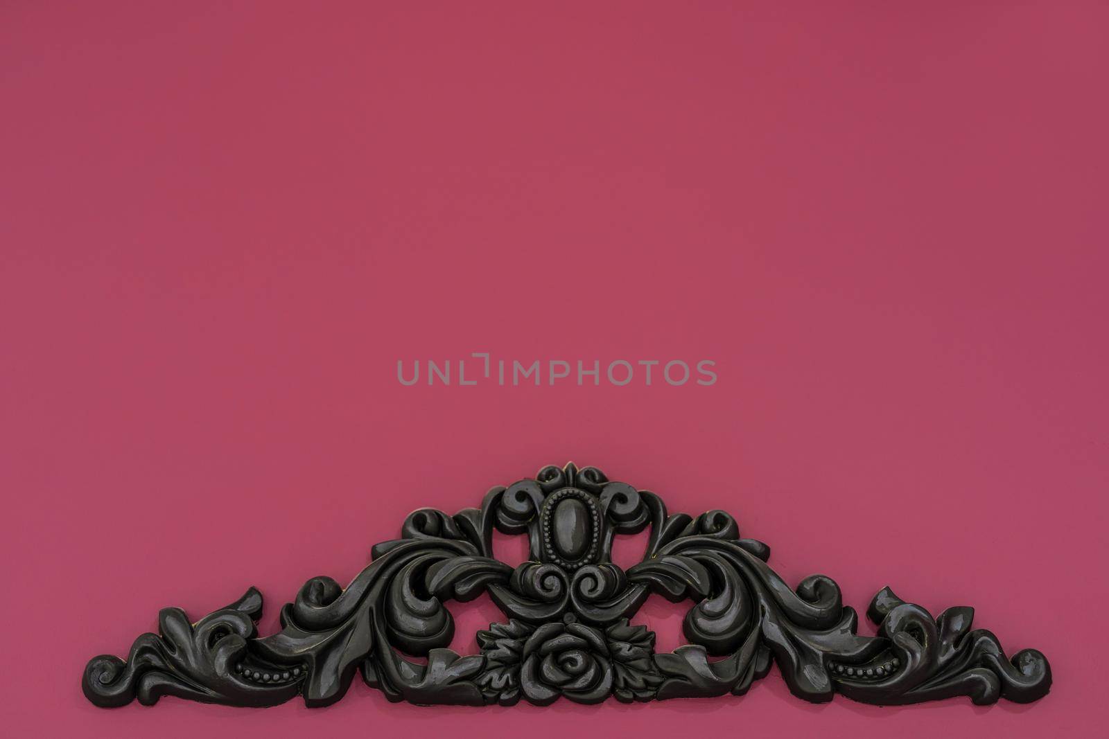 Vintage royal silver horizontal background with black ornaments on a red wall