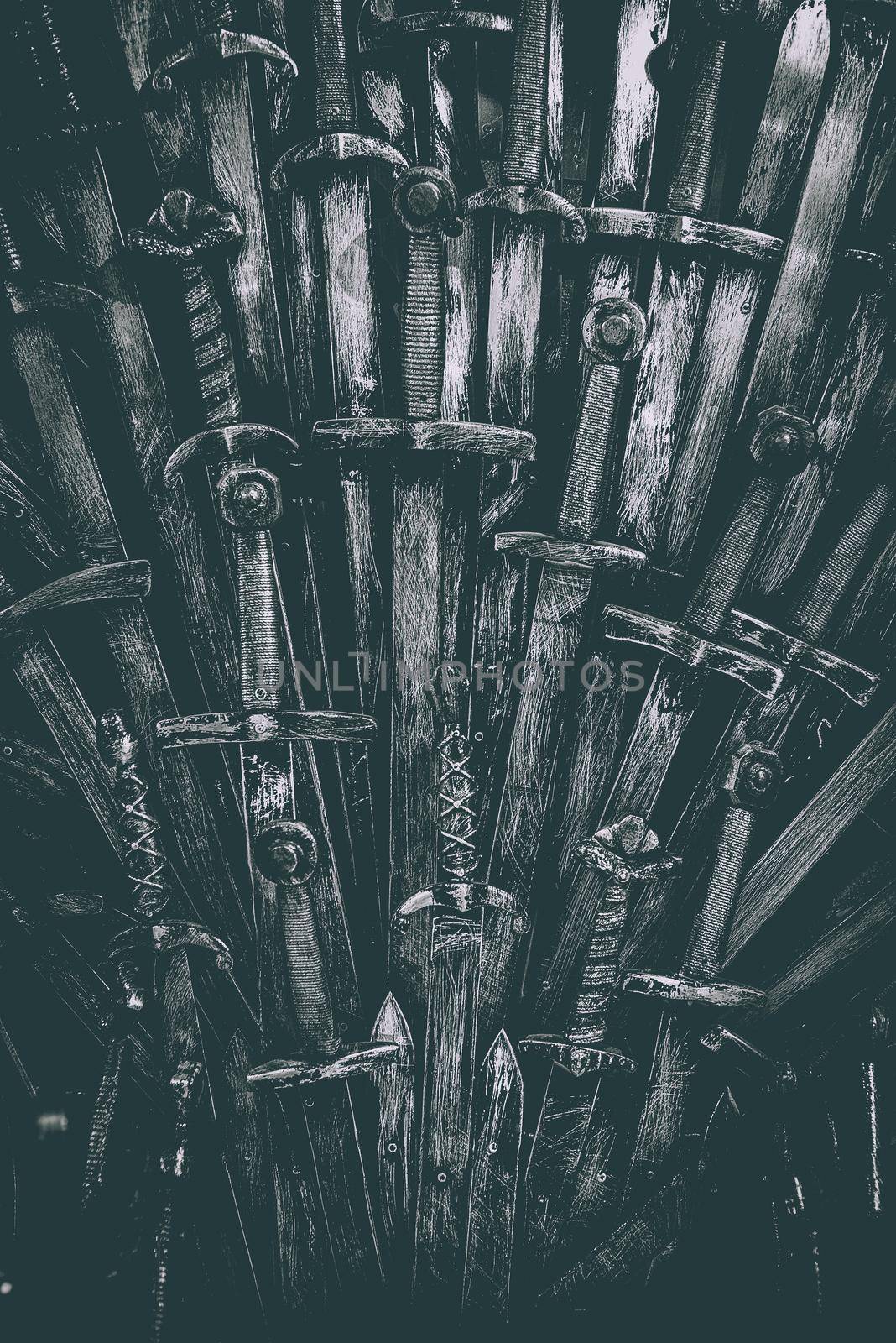 Metal knight swords background. Close up