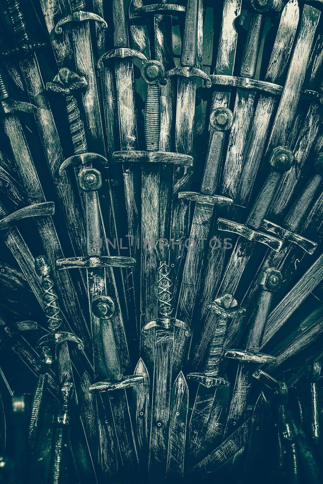 Metal knight swords background. Close up