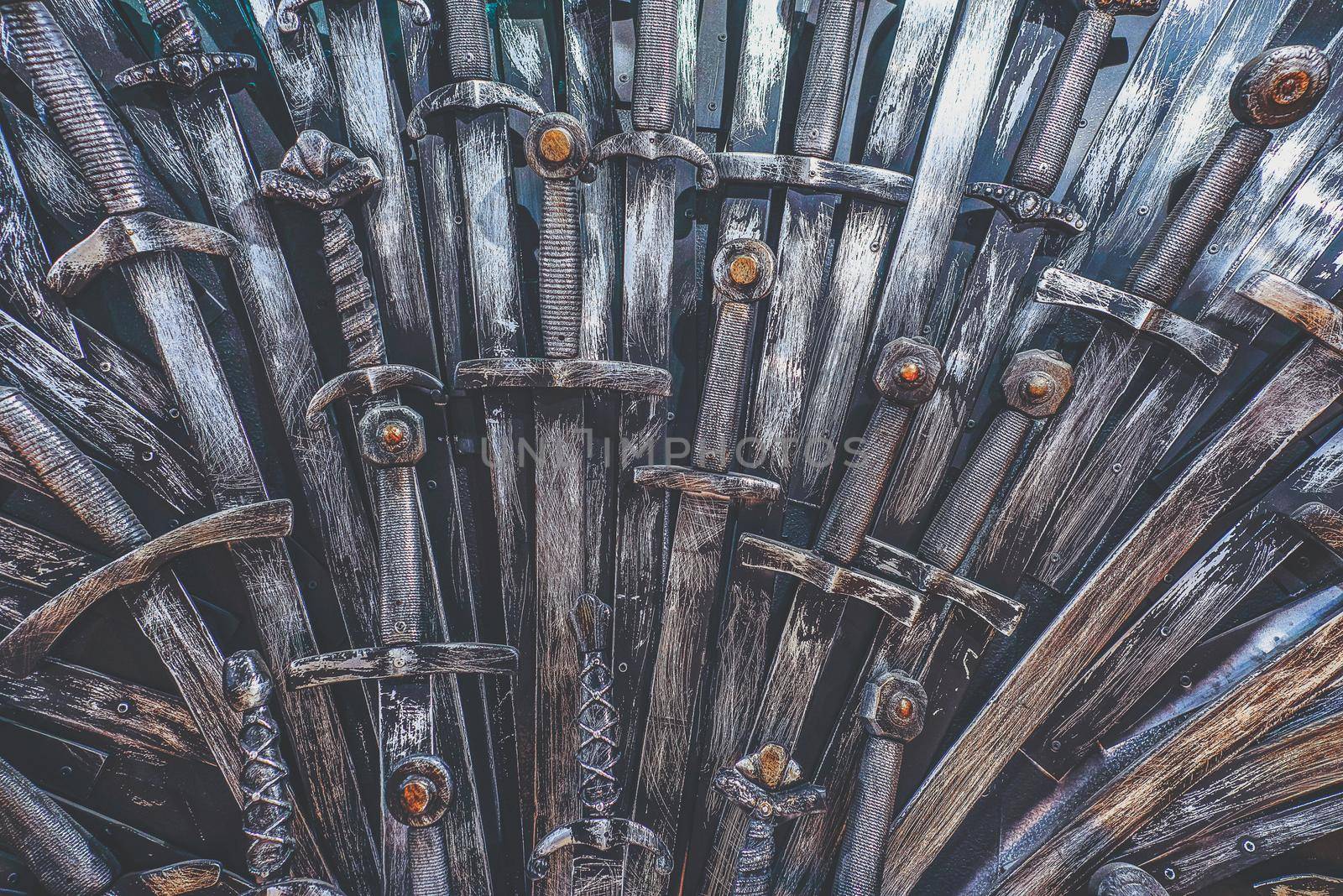 Metal knight swords background. Close up